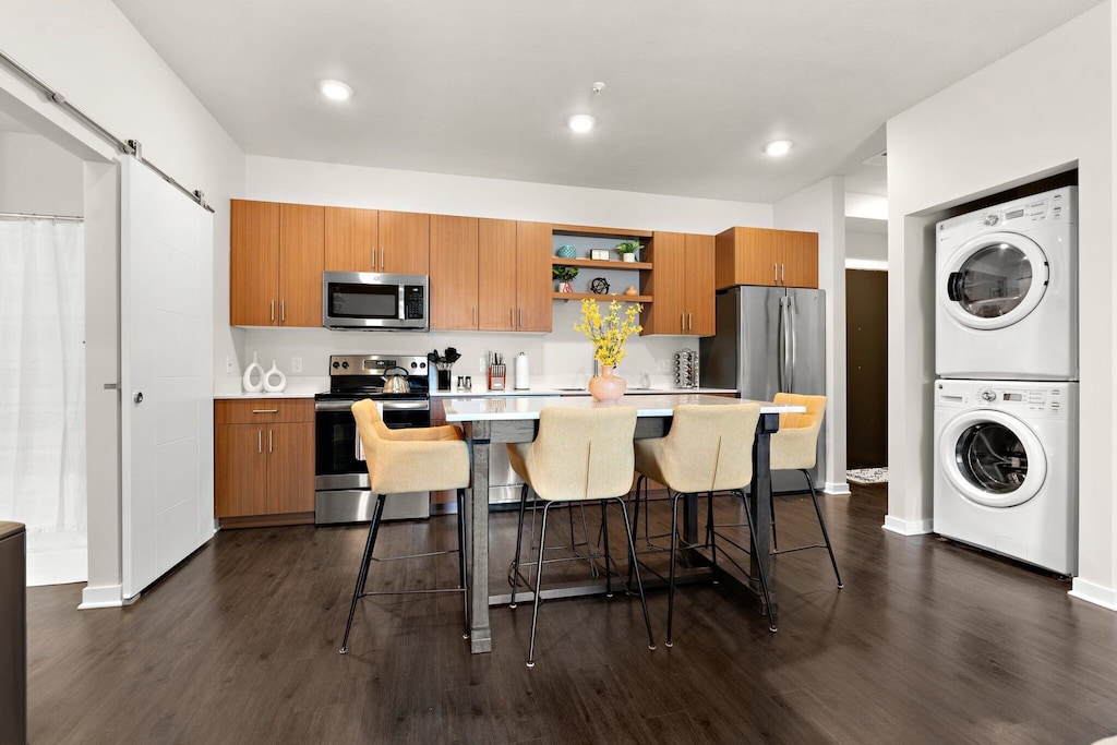 Kitchen dining island comfortably seats 6 for morning coffee, meals, and games!
