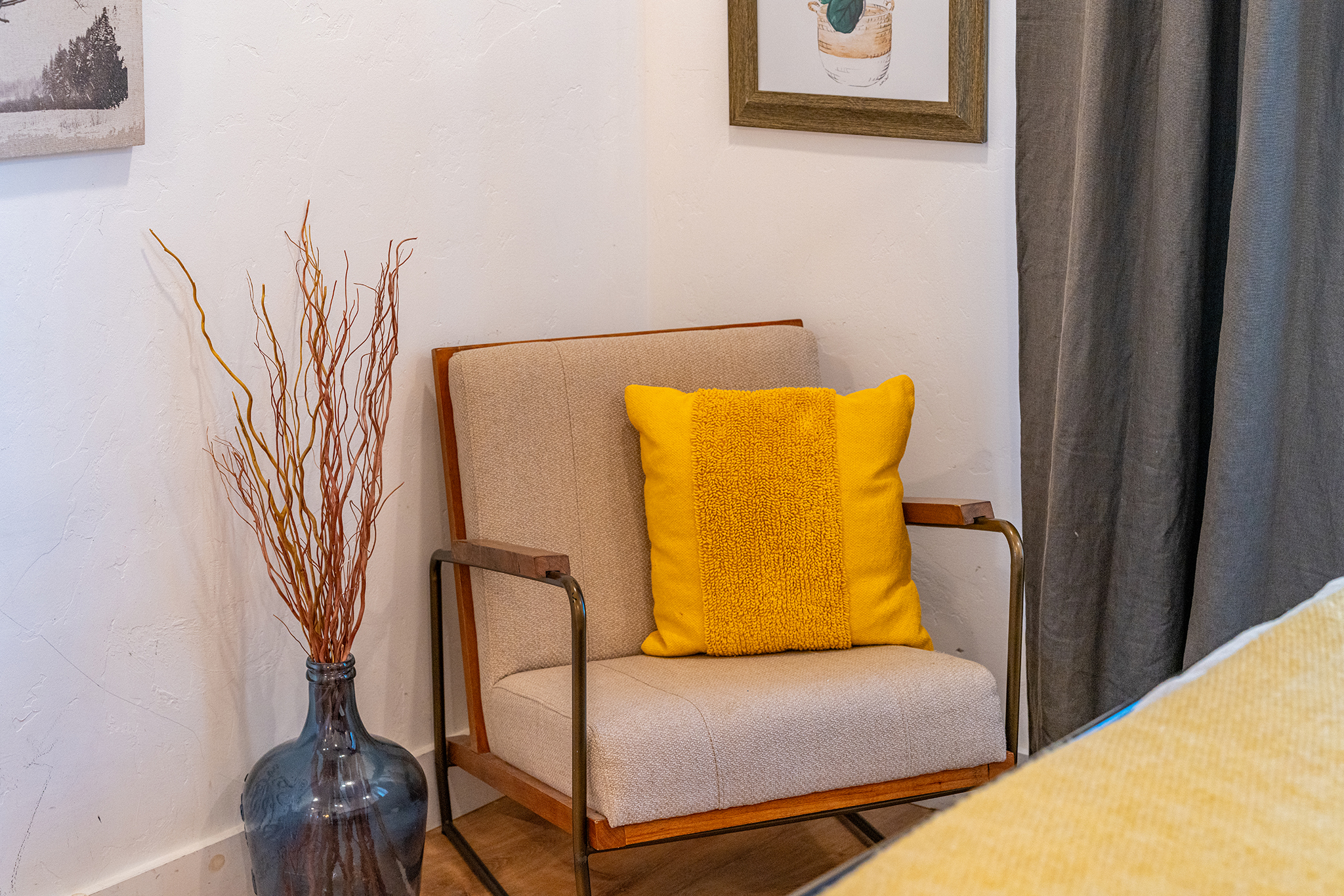 A cozy corner to sip wine, read, or simply relax after a day exploring Fredericksburg.