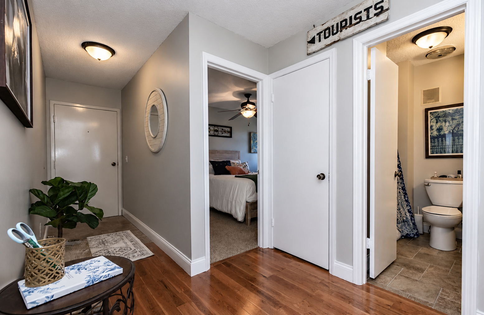 Hallway showing the entry, bedroom and bathroom