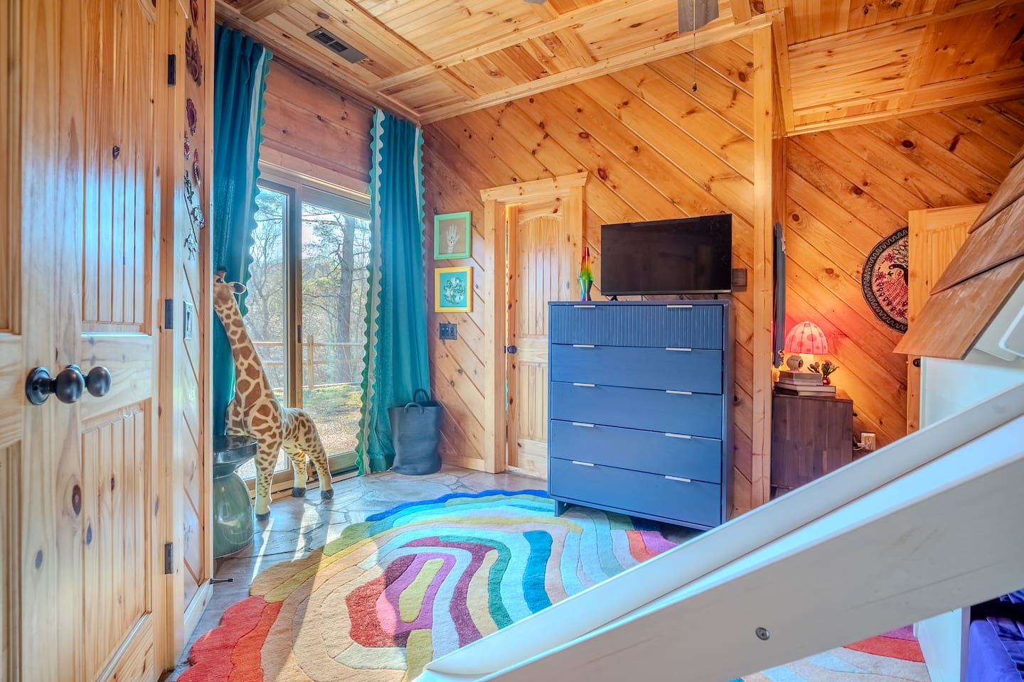Kids room with bunk beds and slide