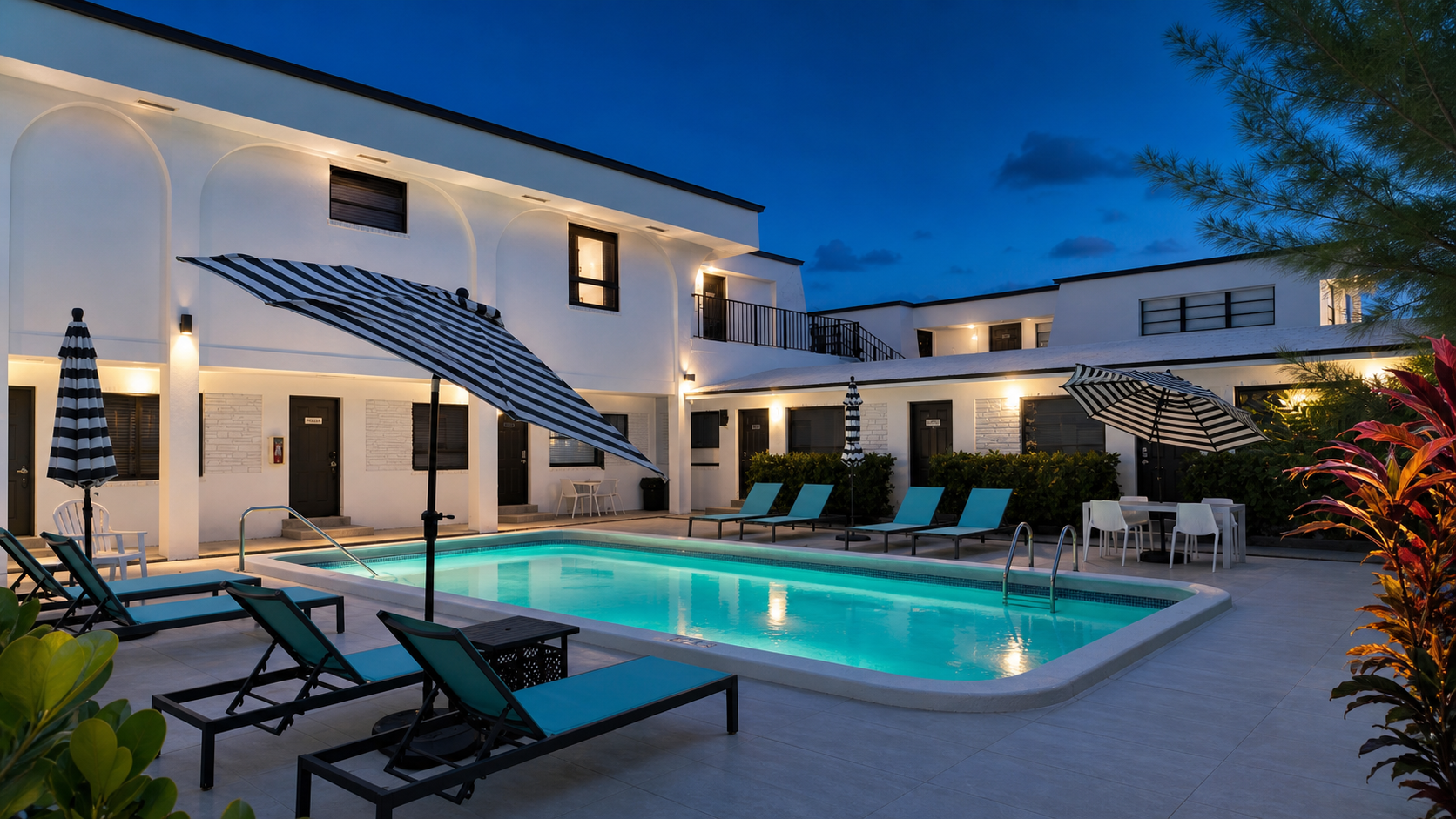 Blue-hour pool courtyard
