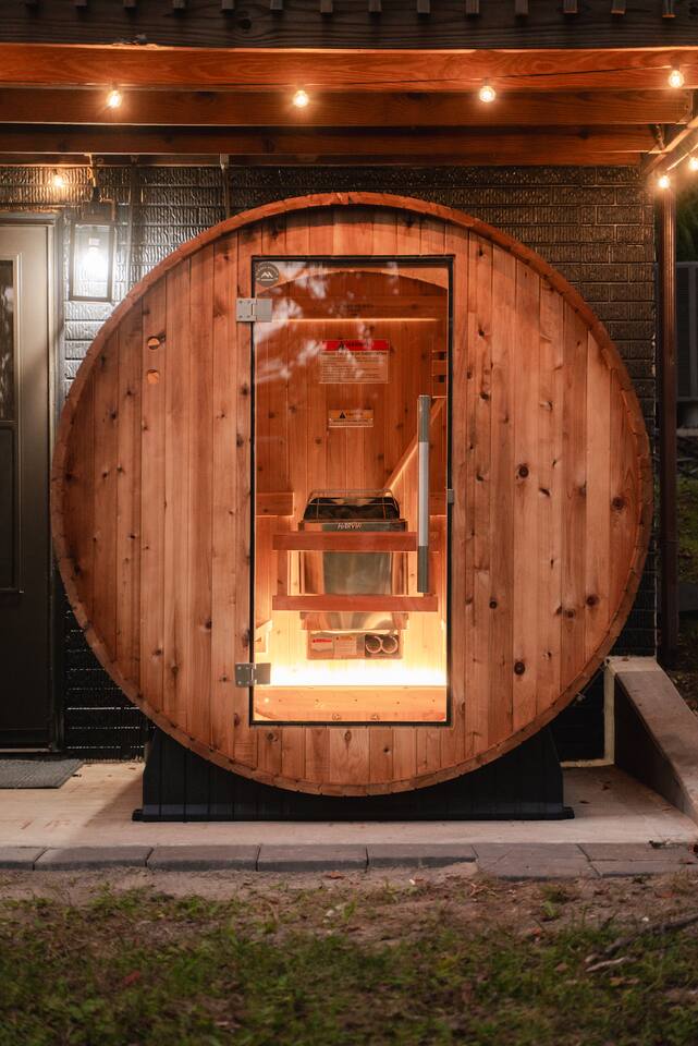 Relax and recharge in the ‘Almost Heaven Sauna,’ a peaceful nature retreat.