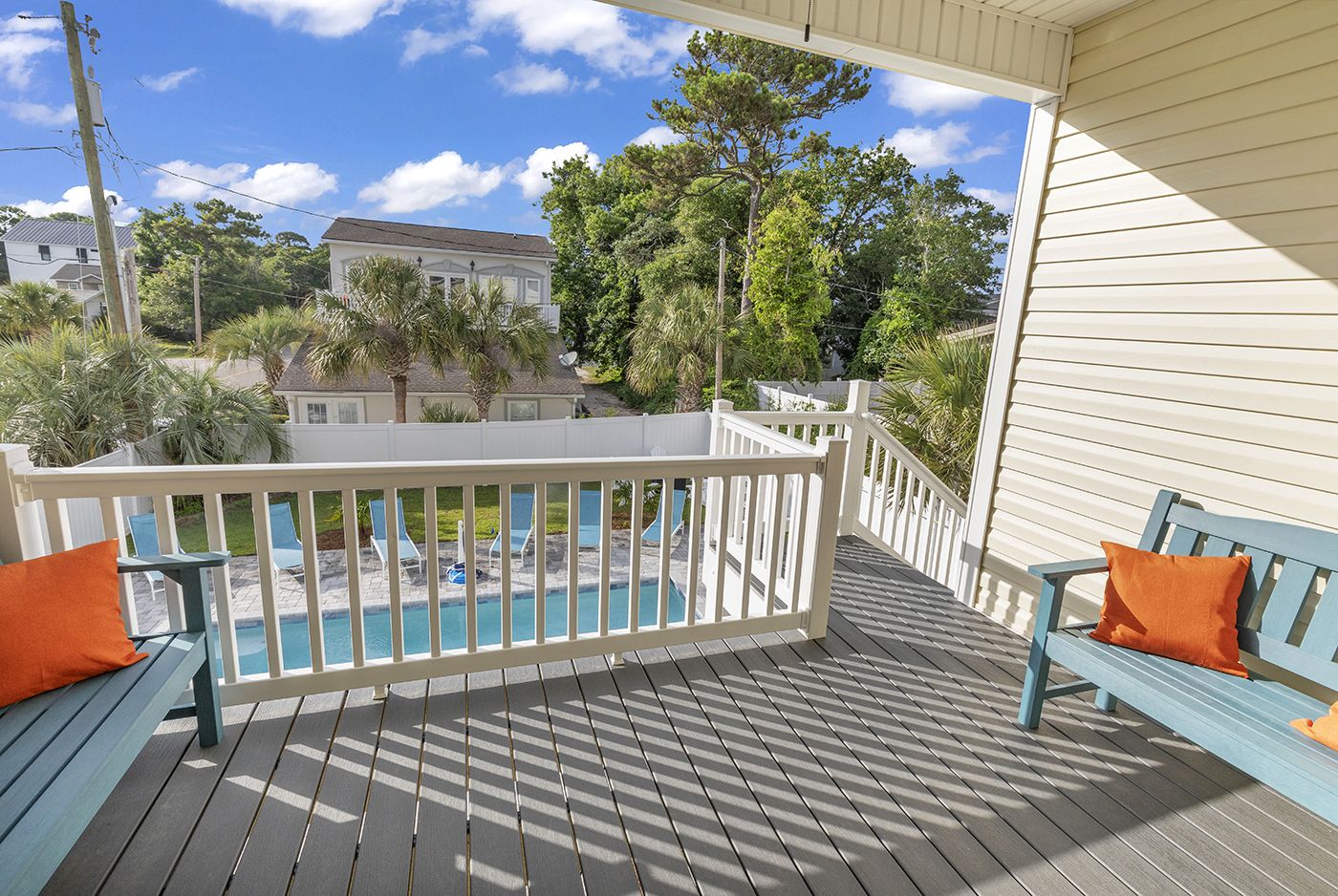 Step into relaxation paradise on our outdoor patio overlooking the shimmering swimming pool. Whether you're soaking up the sun's warmth or enjoying a refreshing breeze, this is the perfect spot to unwind and take in the serene beauty of your surroundings.