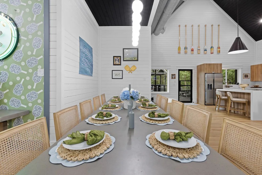 Dining Room: Gather around the stylish table for unforgettable meals amidst vibrant decor!