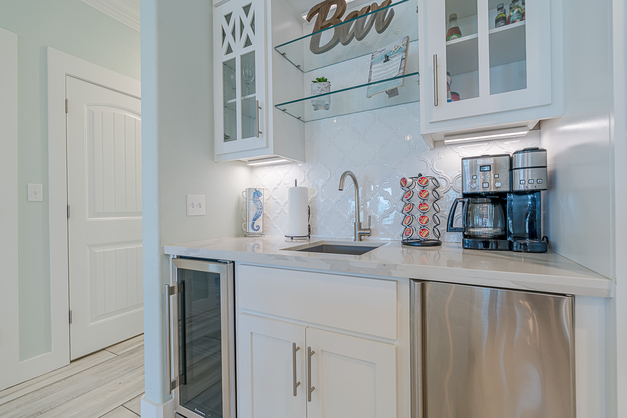 Coffee bar with wine cooler and new ice maker.