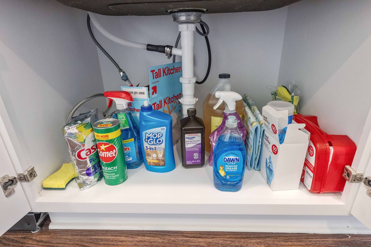 First aid kit under the sink. 