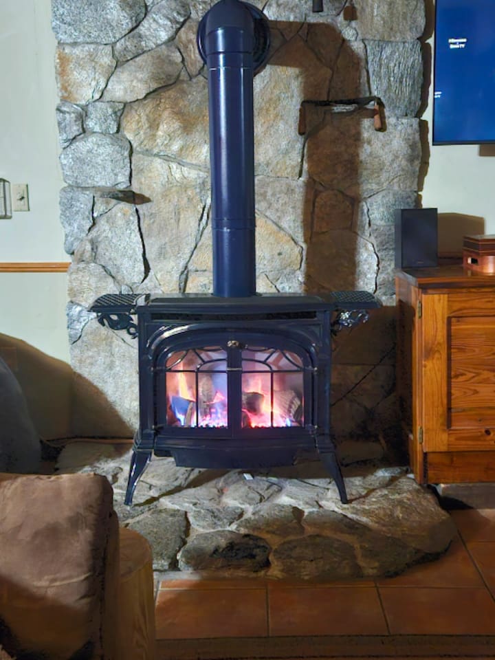 Cozy up next to this beautiful stove after a soak in the hot tub on a cold night! 