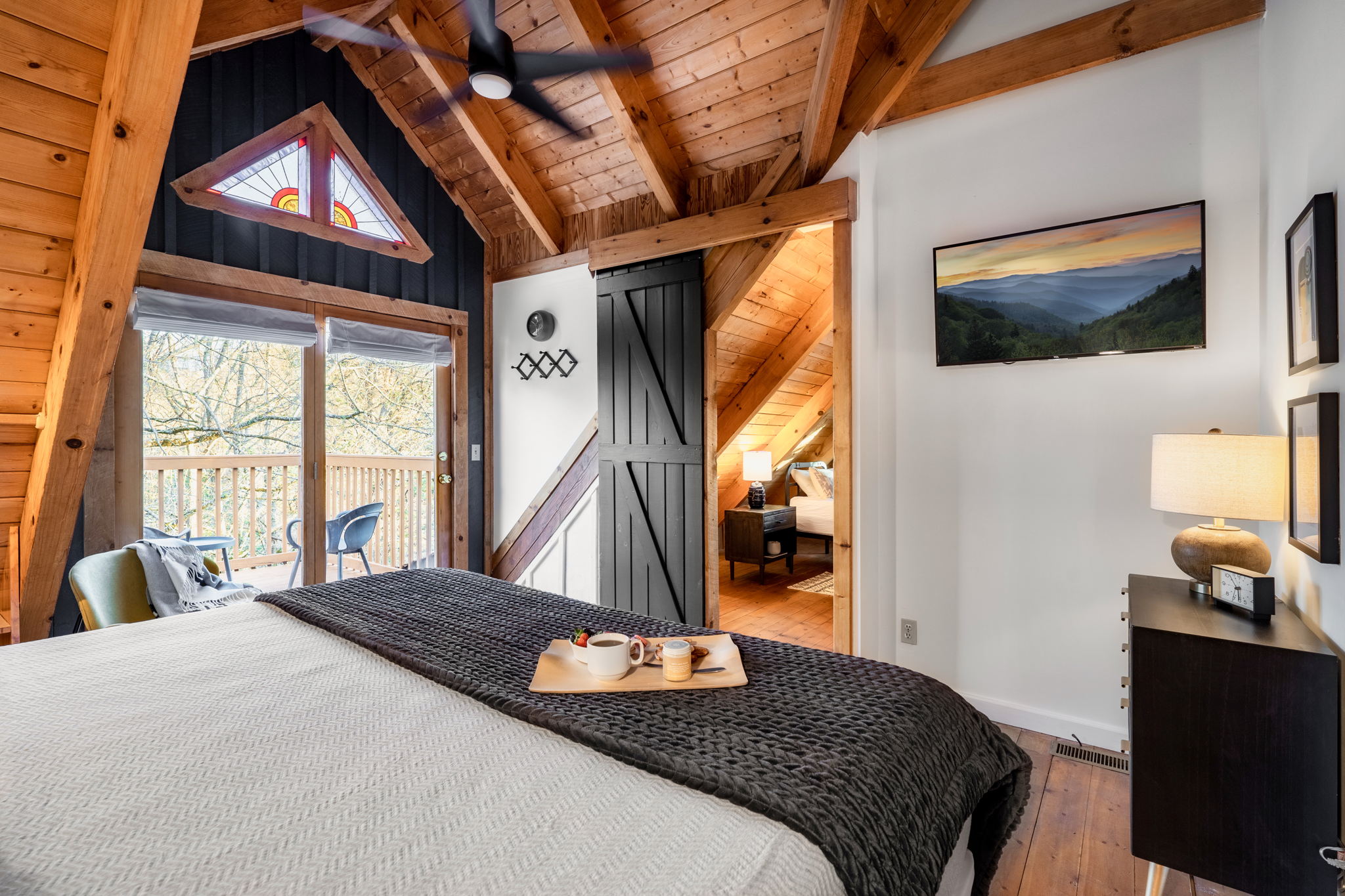 Indulge in luxury with our suite featuring an ensuite bathroom and a king bed equipped with Roku for endless entertainment options.