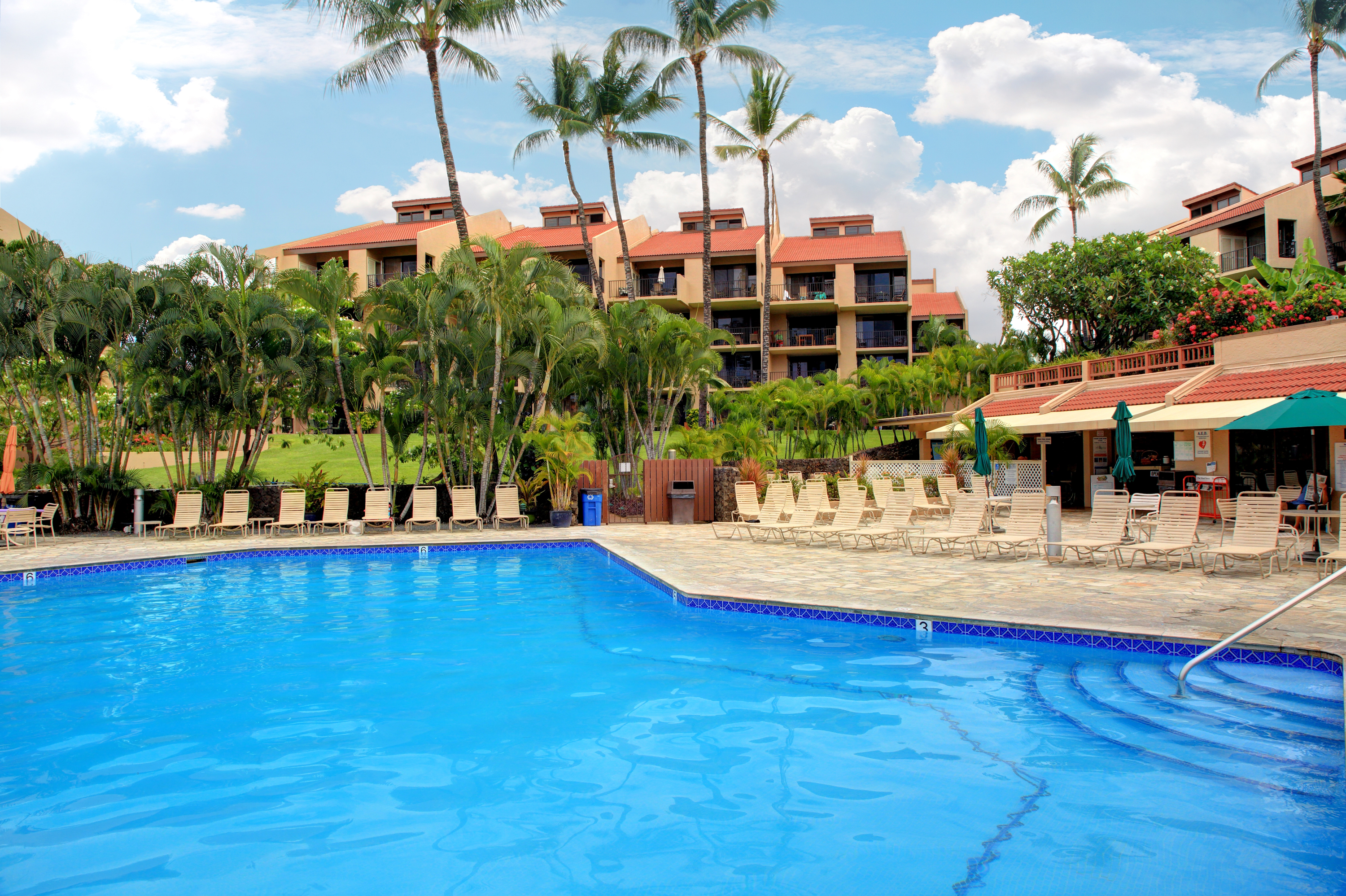 Kamaole Sands features a large pool area with kiddie pool, two hot tubs and gym