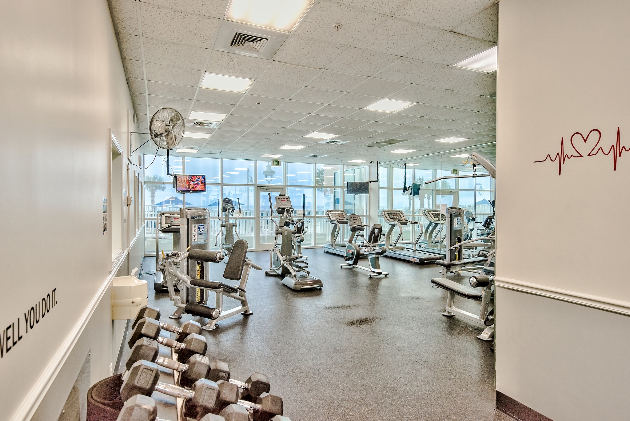 Large, well appointed fitness center (treadmills, stationary bikes, ellipticals, weight machines, and free weights) at Majestic Sun with Pool and Gulf view