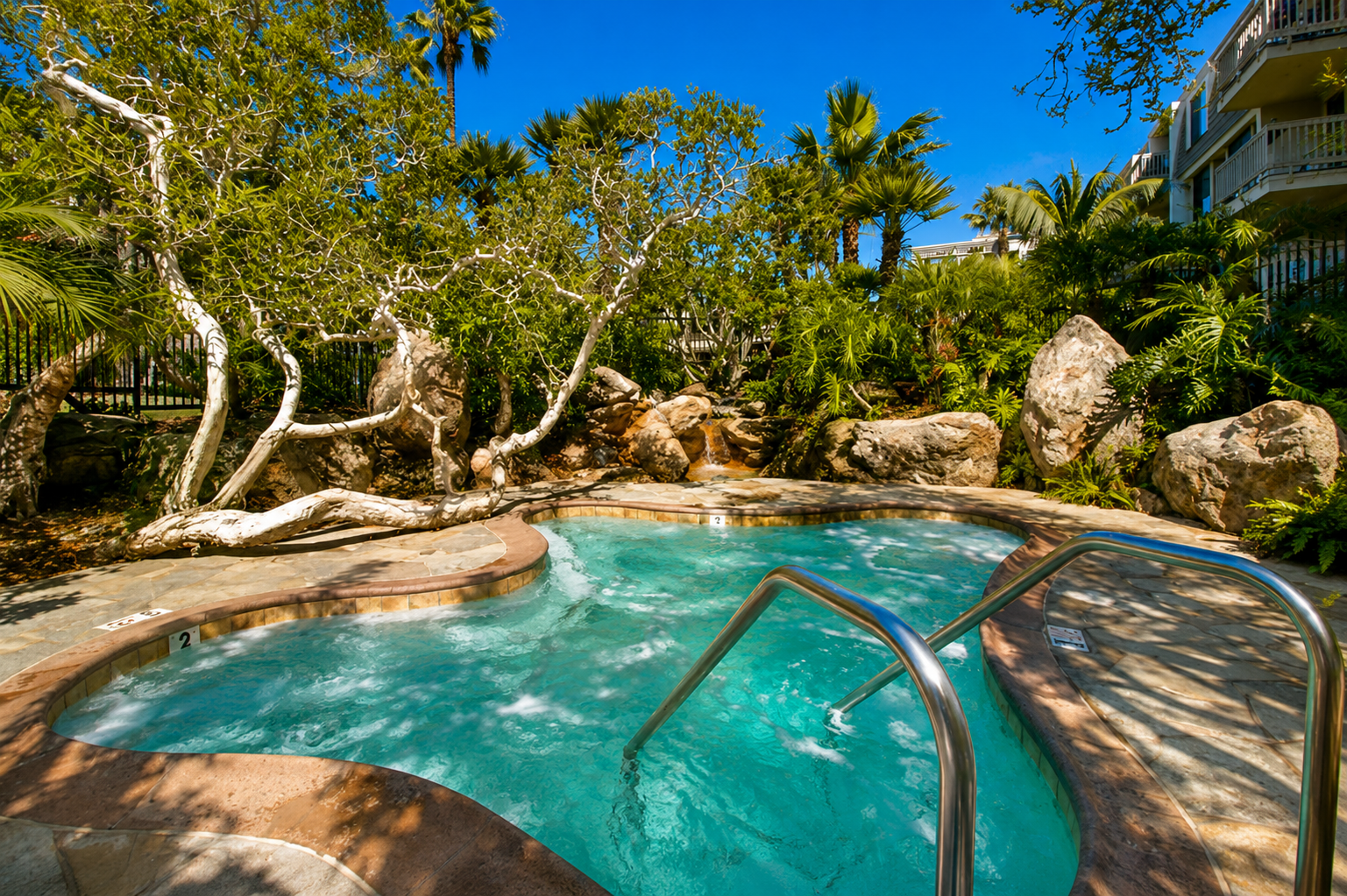 Oversized hot tub in a tropical setting