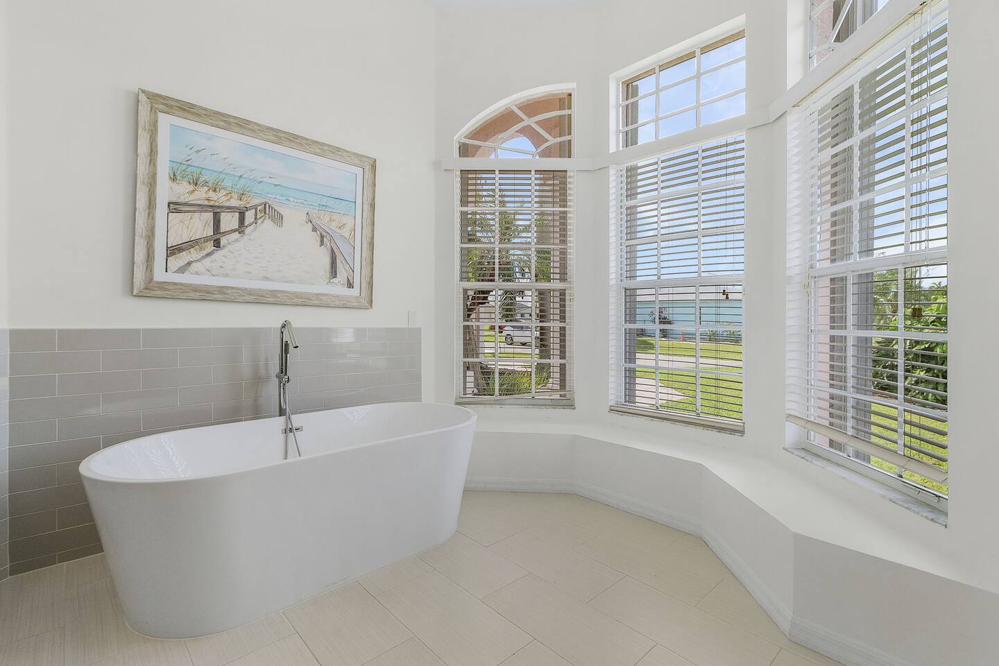 Immerse yourself in the luxurious tub and let your worries melt away in a blissful escape!