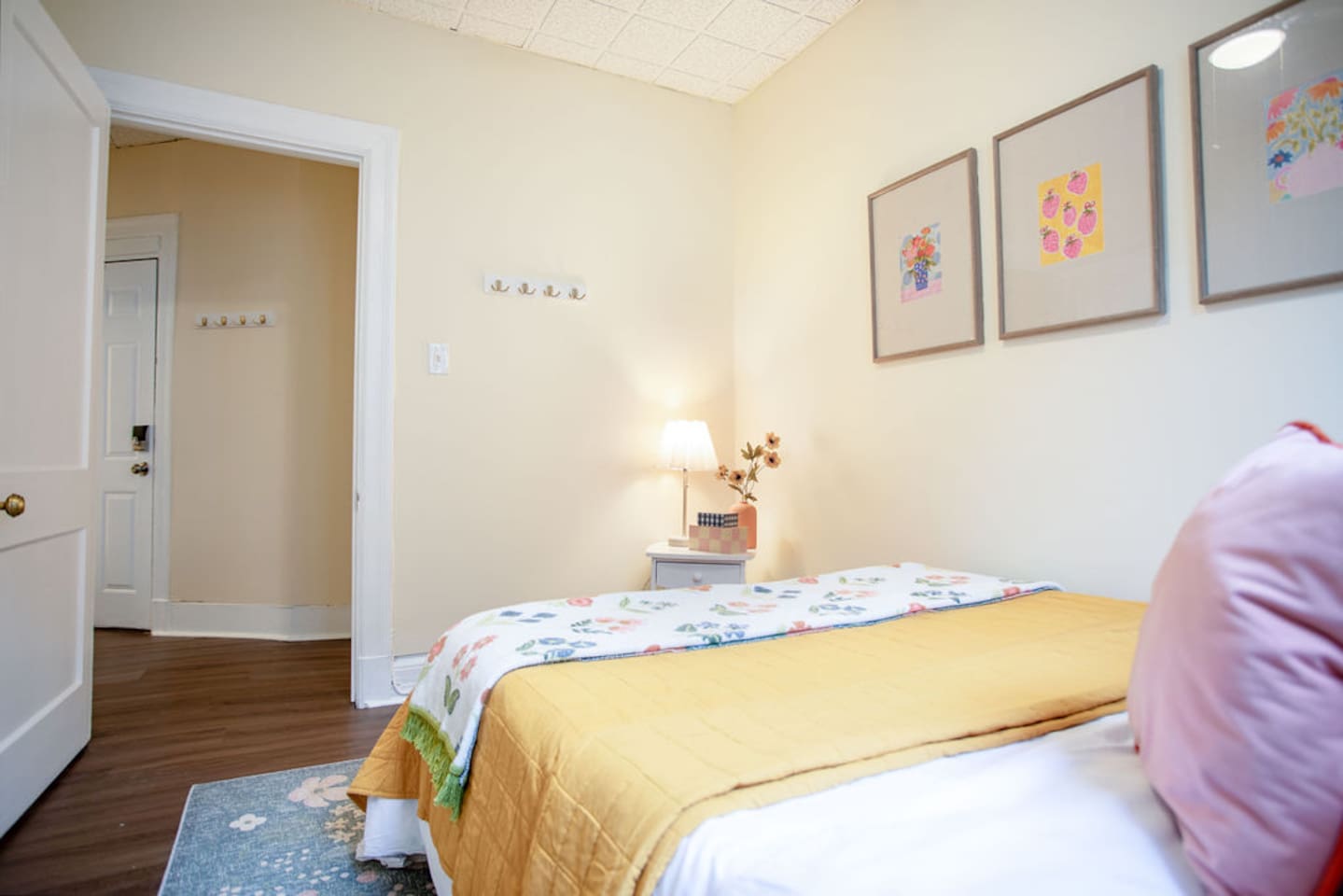 Comfortable queen-sized bedroom offering a restful retreat with ample space and natural light.