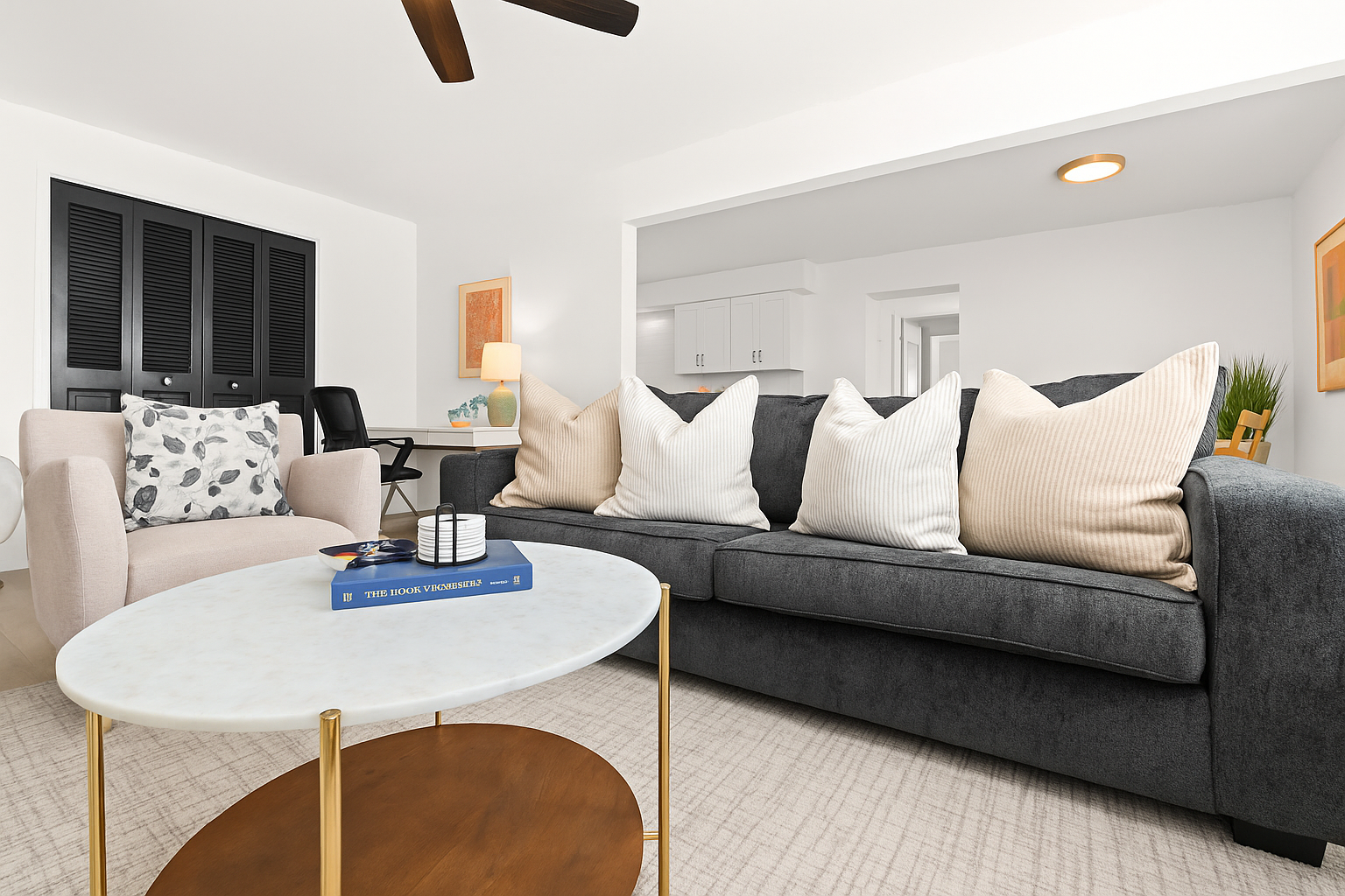 Open-concept lounge featuring modern furniture, natural light, and a cozy vibe for movie nights or casual hangouts.