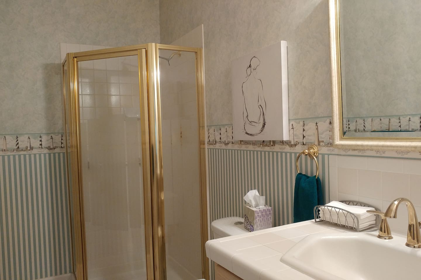 Main level bathroom with shower.
