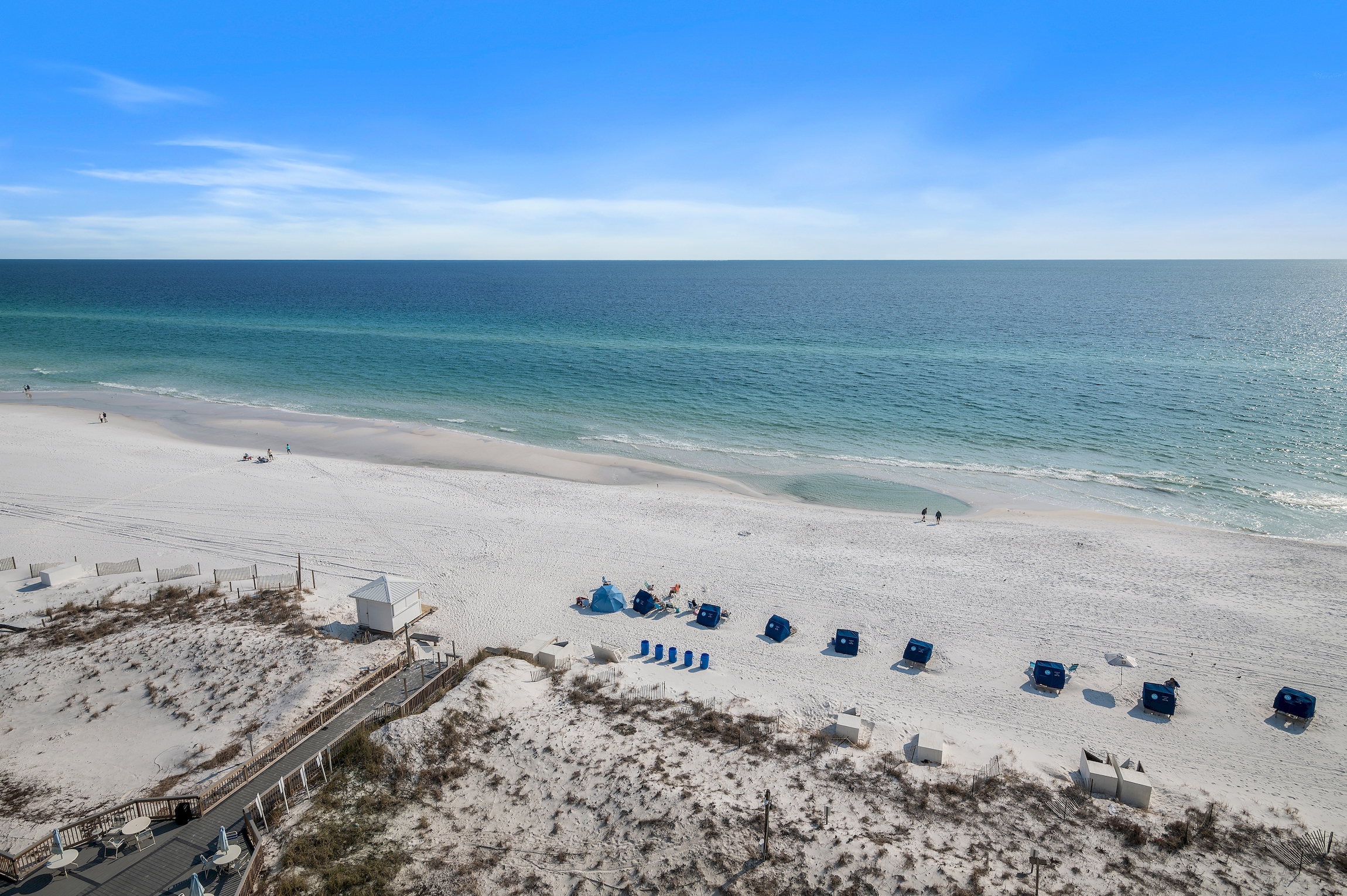 Emerald blue Ocean with white sands of Destin at at Pelican Beach Resort Destin FL