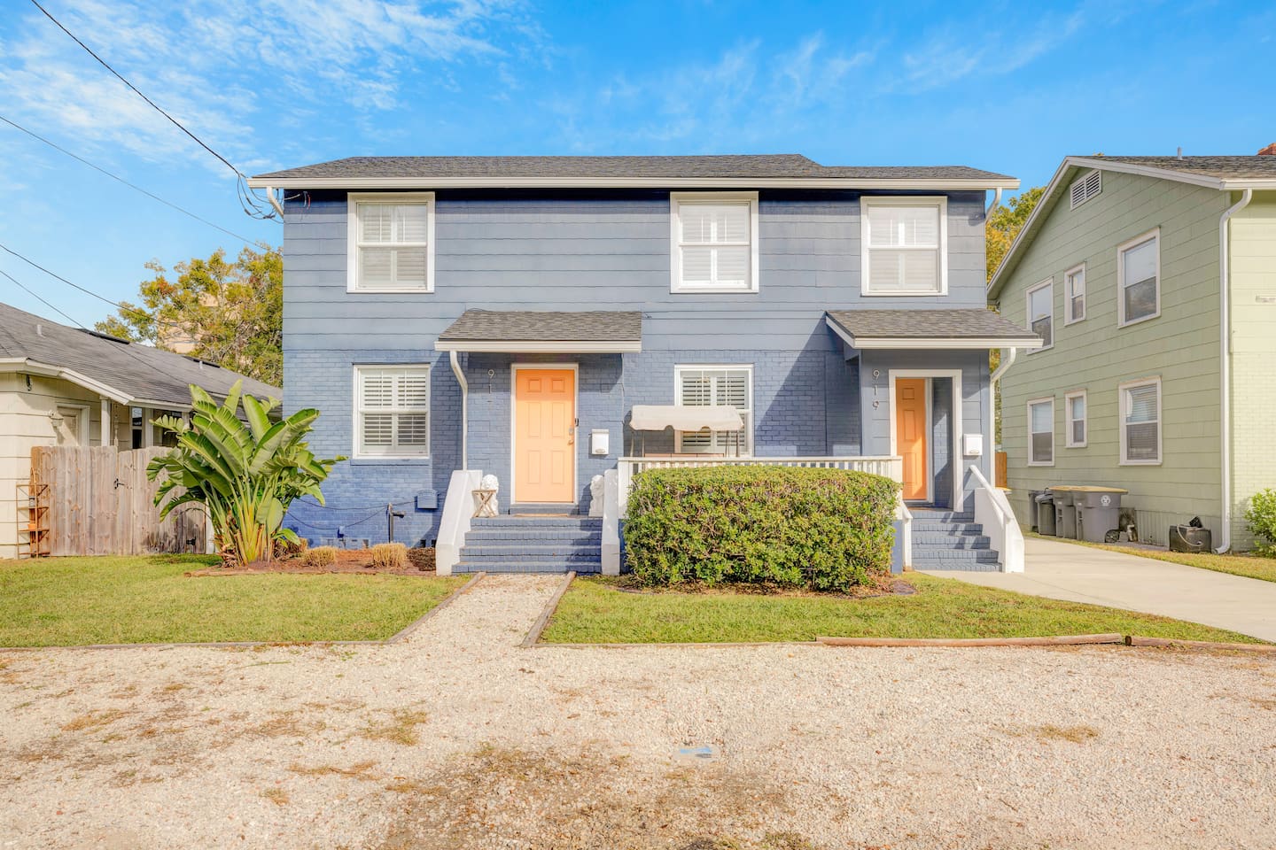 Entrance to home is on the right side, parking in front gravel area or right sided driveway, swing on front porch
