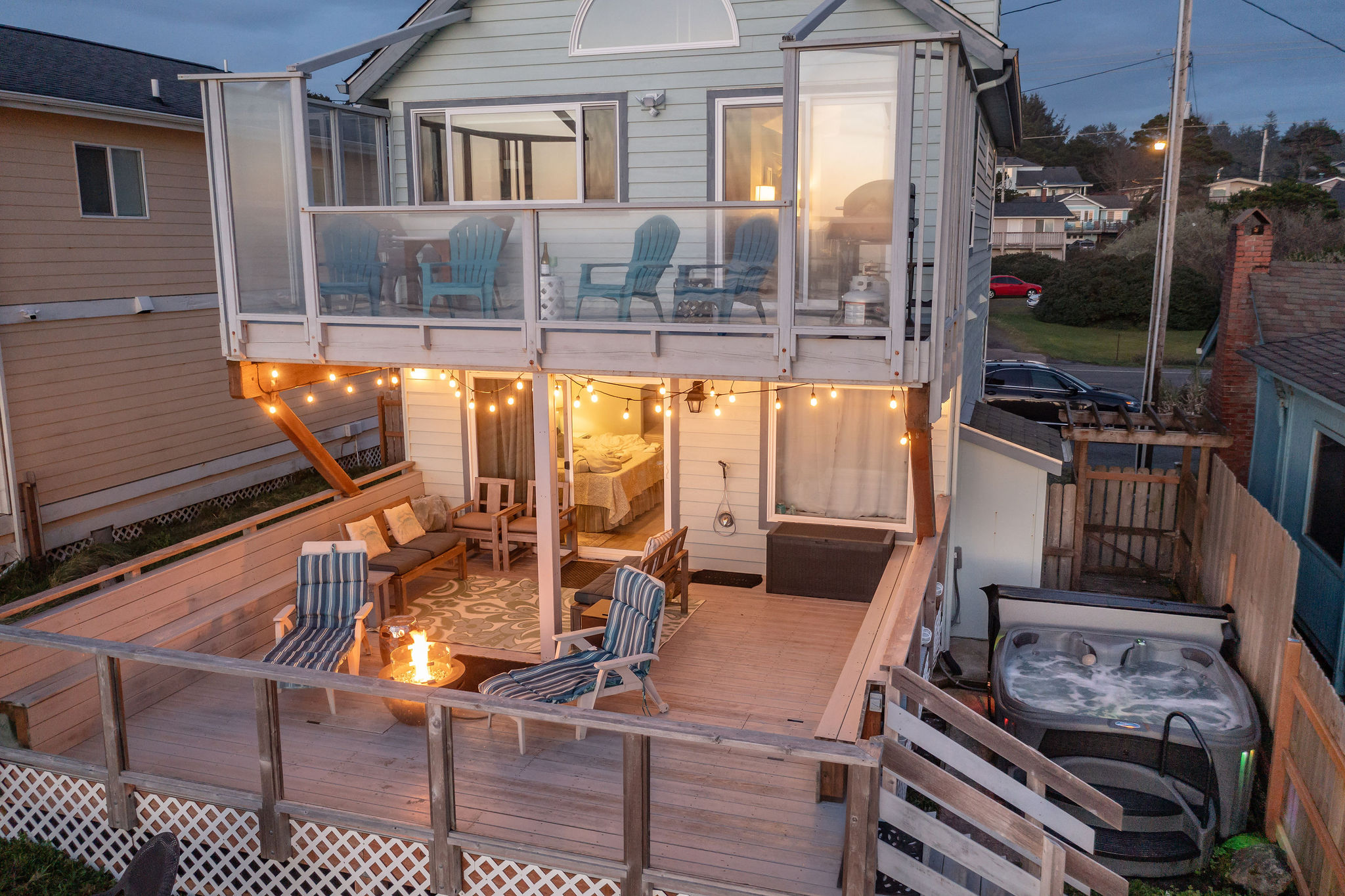 Wake up to the sound of waves and the beauty of the sea with a cozy fireplace on the deck overlooking the ocean's charming horizon. Including the relaxing hot tub on the side. 