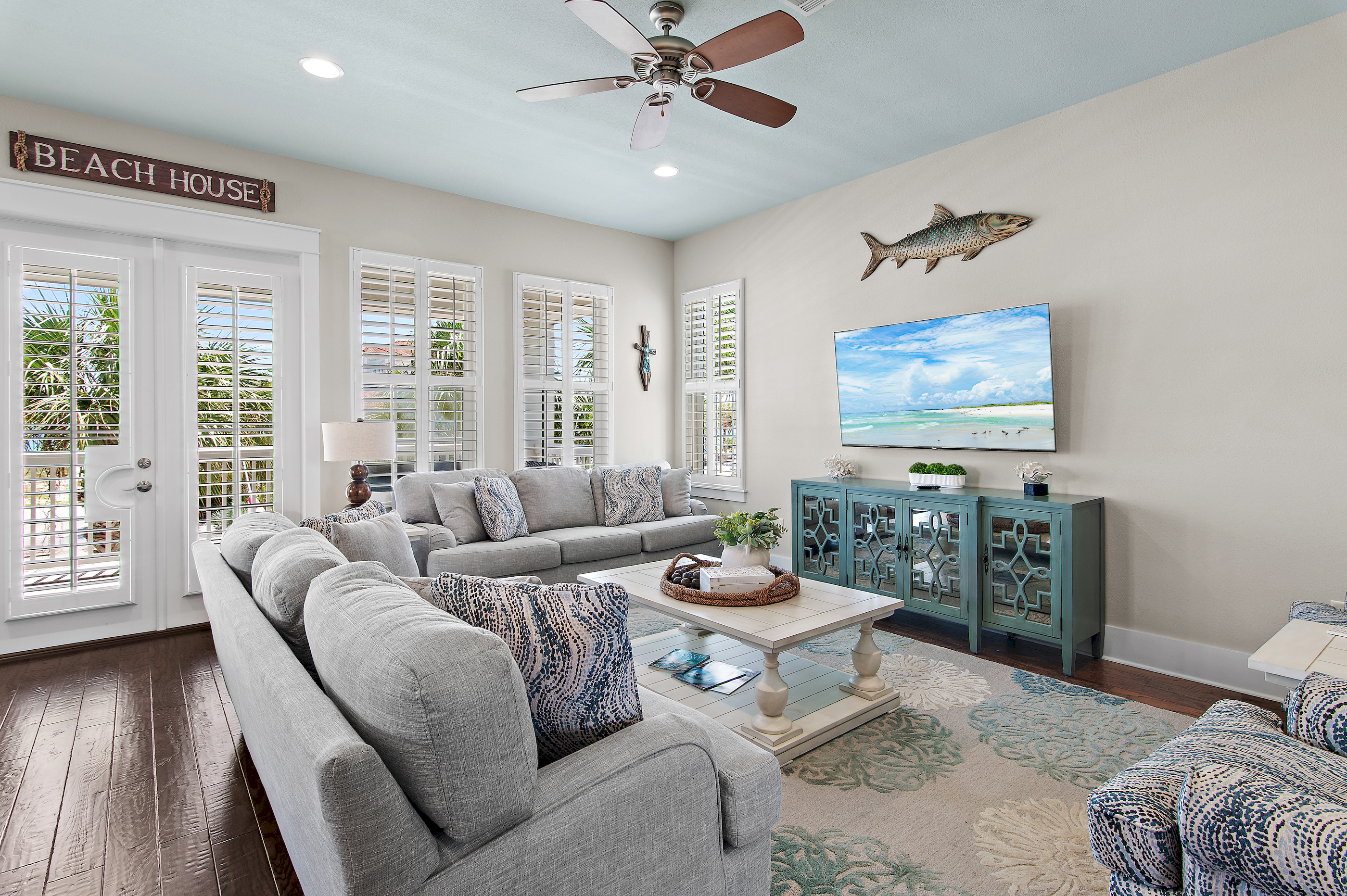 Gather with family and friends in this spacious, inviting retreat with beautiful 30A charm.