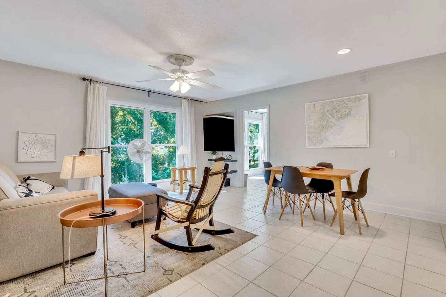 Open living and dining area with Smart TV