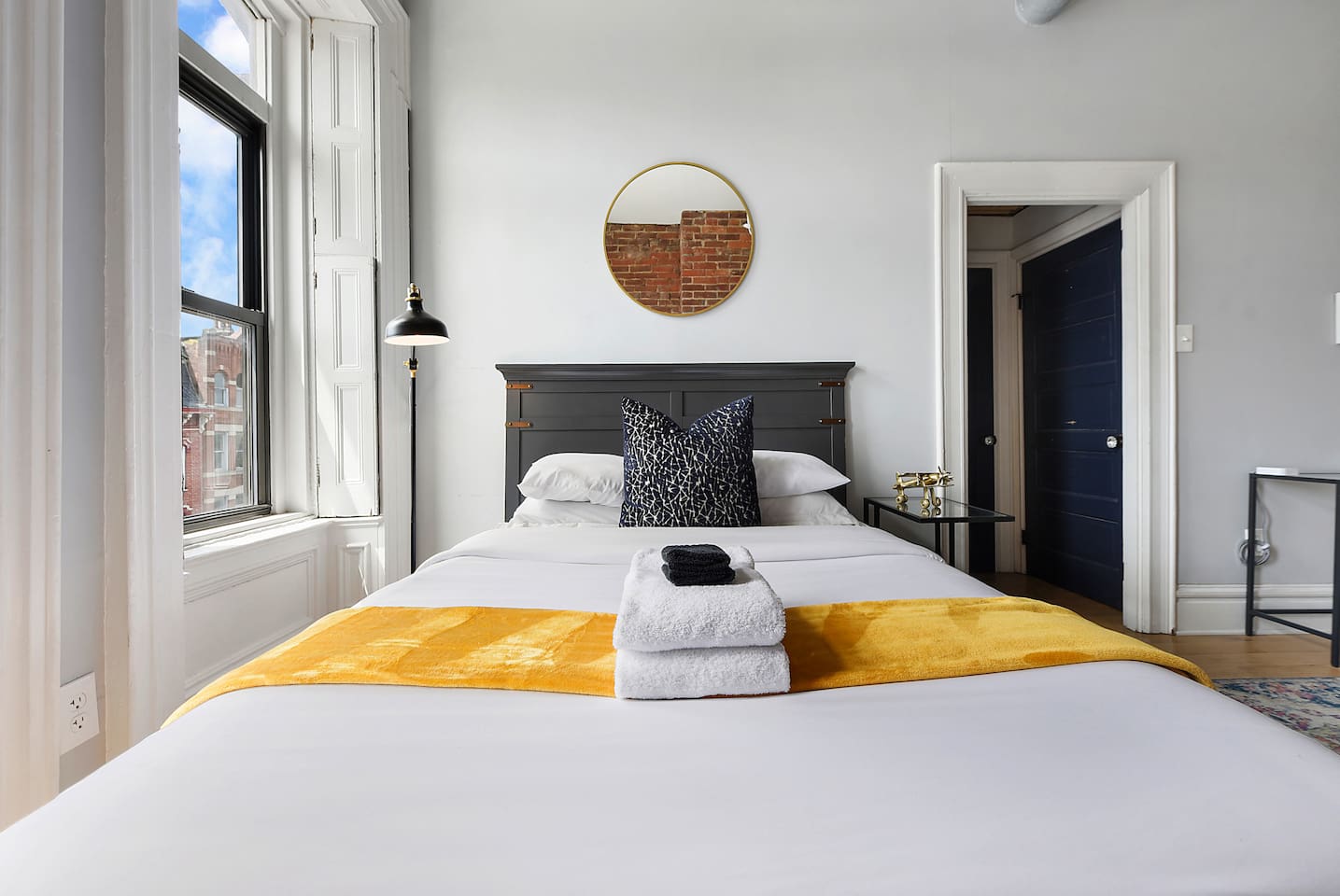 Spacious and elegant queen-sized bedroom designed for comfort and style.