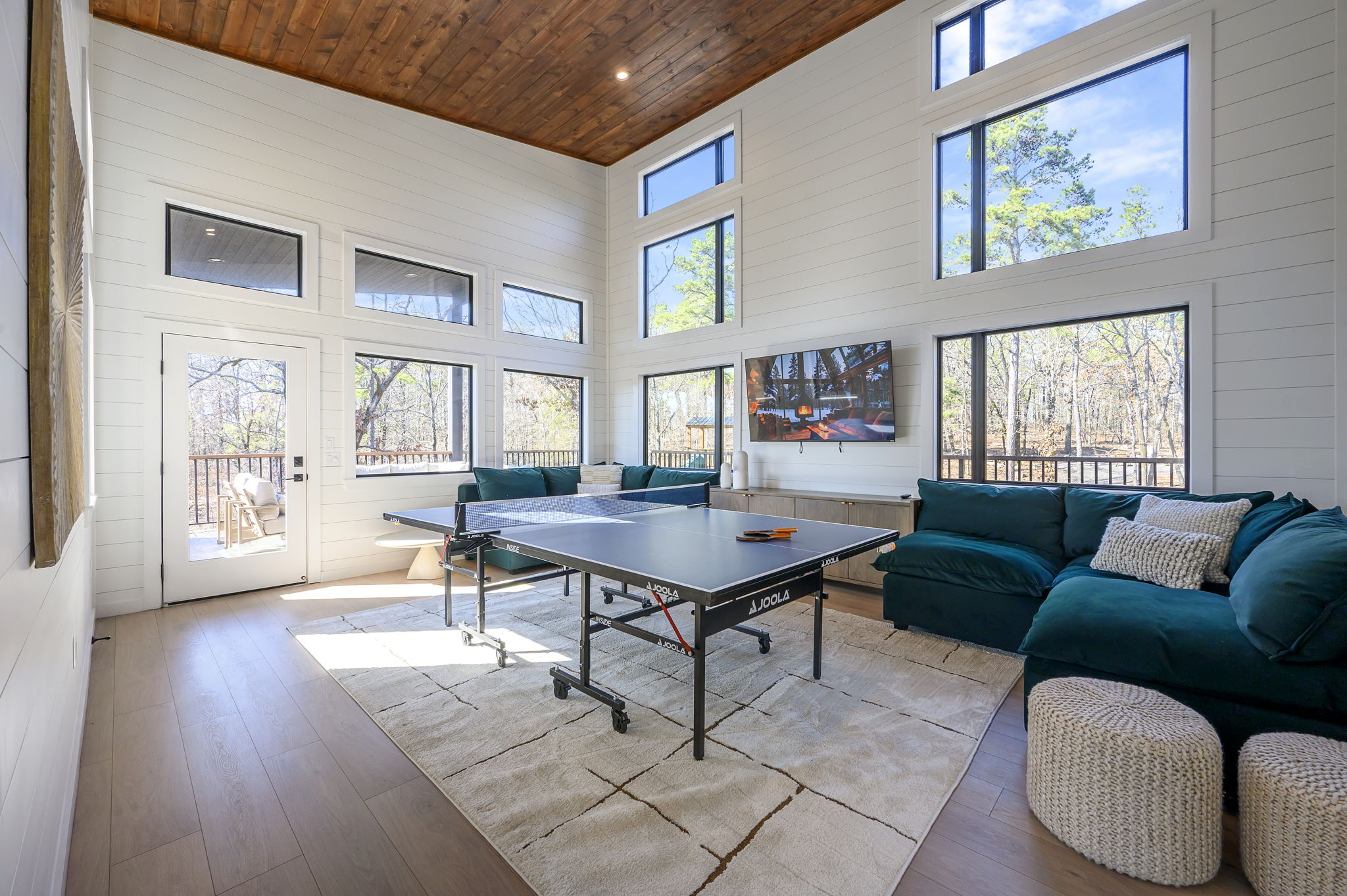 Game Room - Includes a full-sized ping-pong table + board games + Smart TV. Paddles and balls are included.