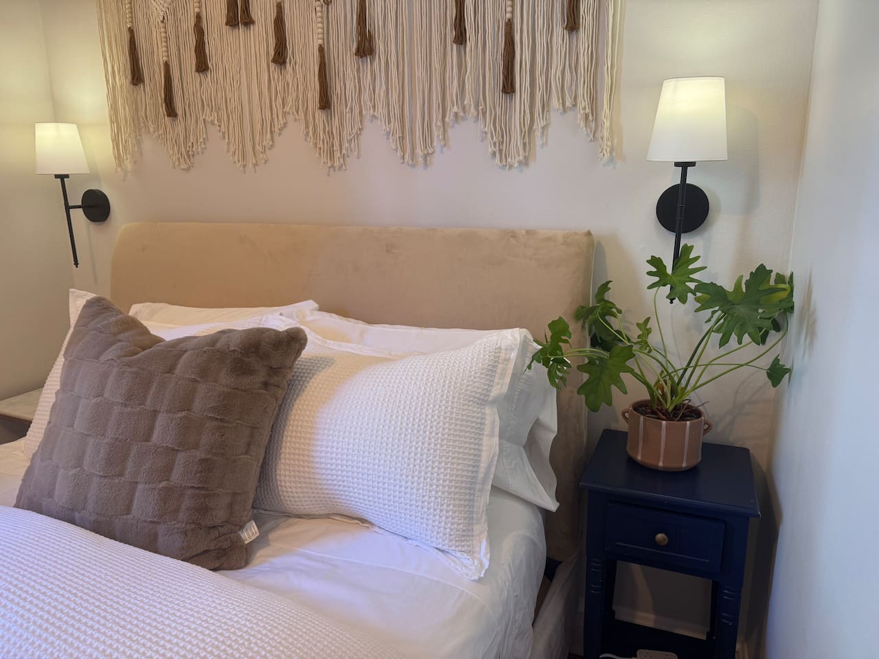 Bedroom with elegant decor comfortable soft linens and relaxing atmosphere.