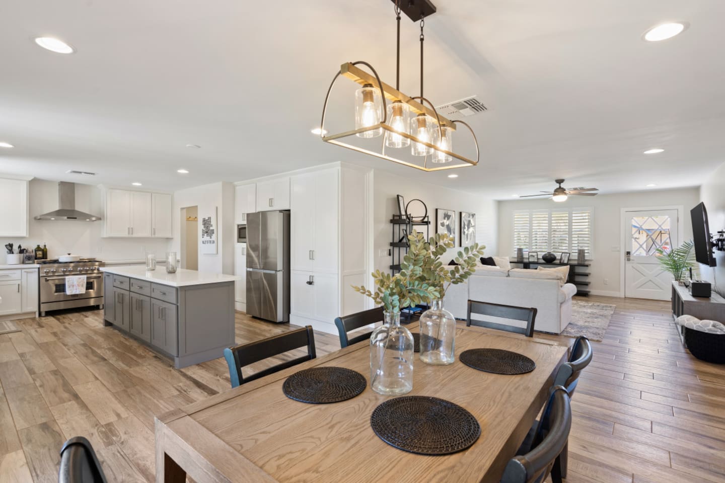 Dining area with table seating, open kitchen views, and easy flow into the living room for meals or gathering.