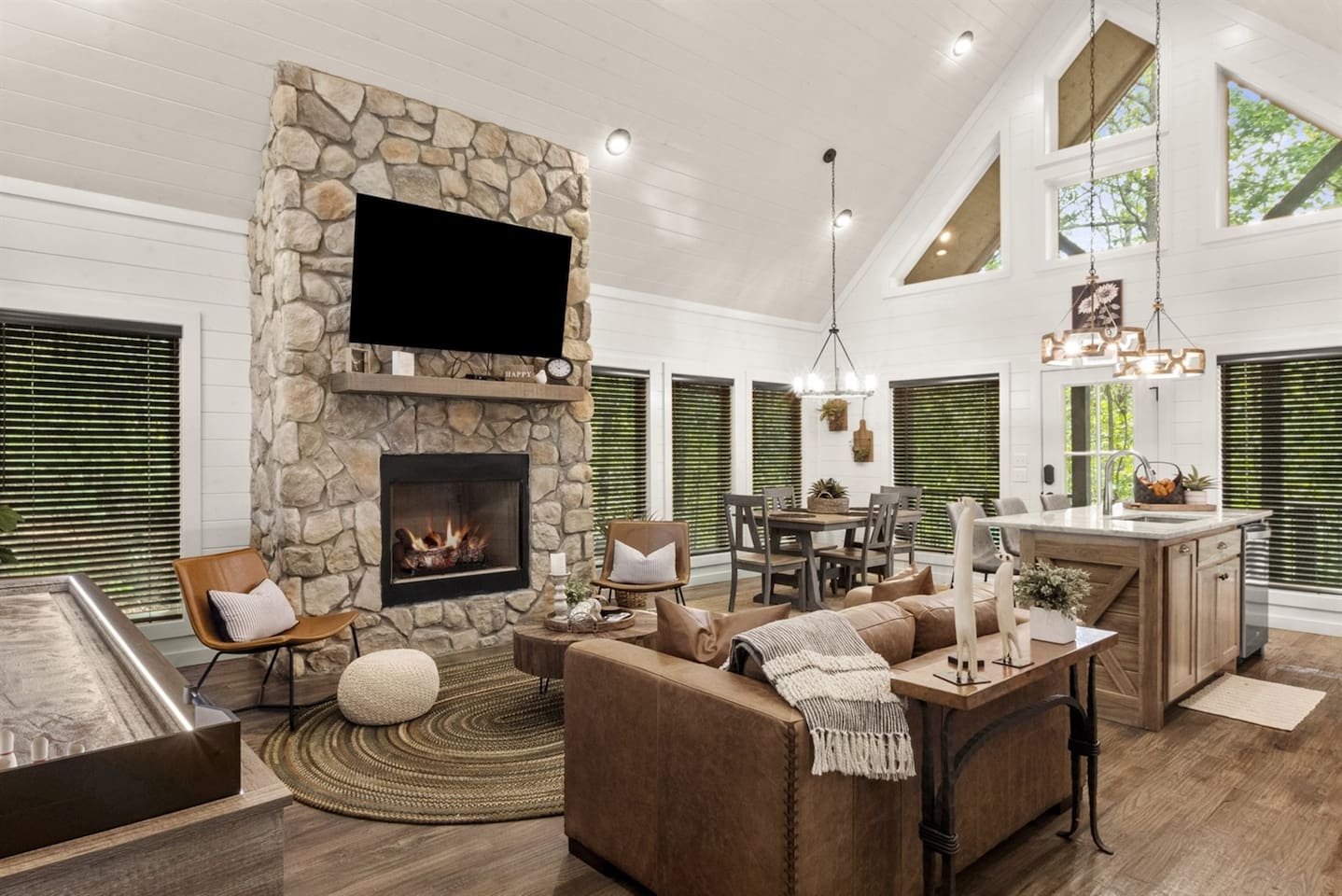 Gather with loved ones in a warm living room that feels like home from the moment you walk in.