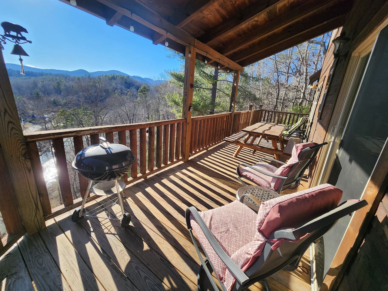 Upper level back deck, fully enclosed with view of river 