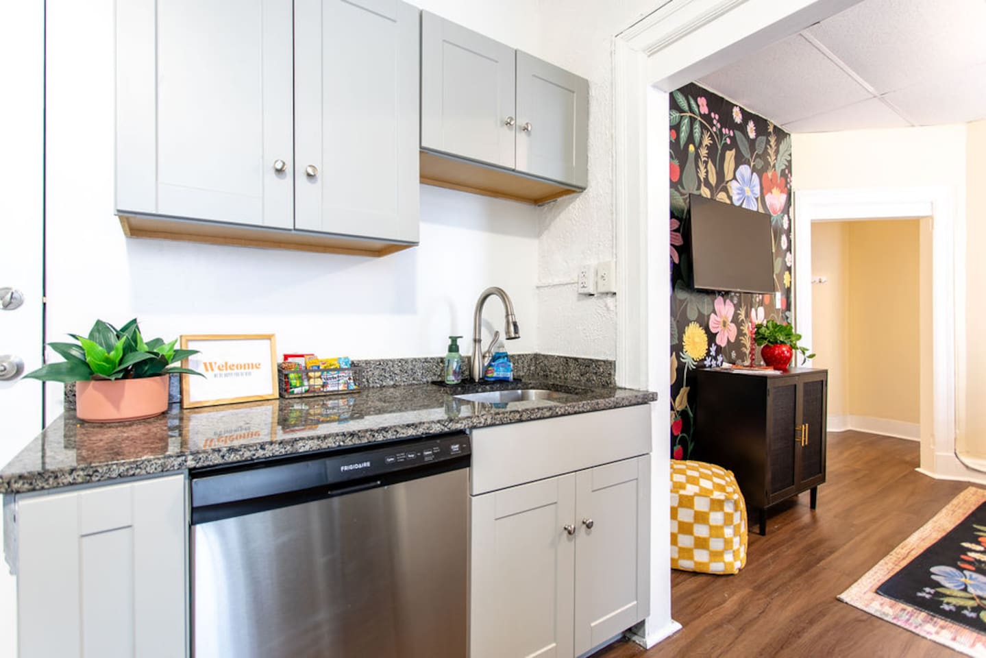 Full kitchen featuring sleek, modern stainless steel appliances for a stylish and functional cooking space.
