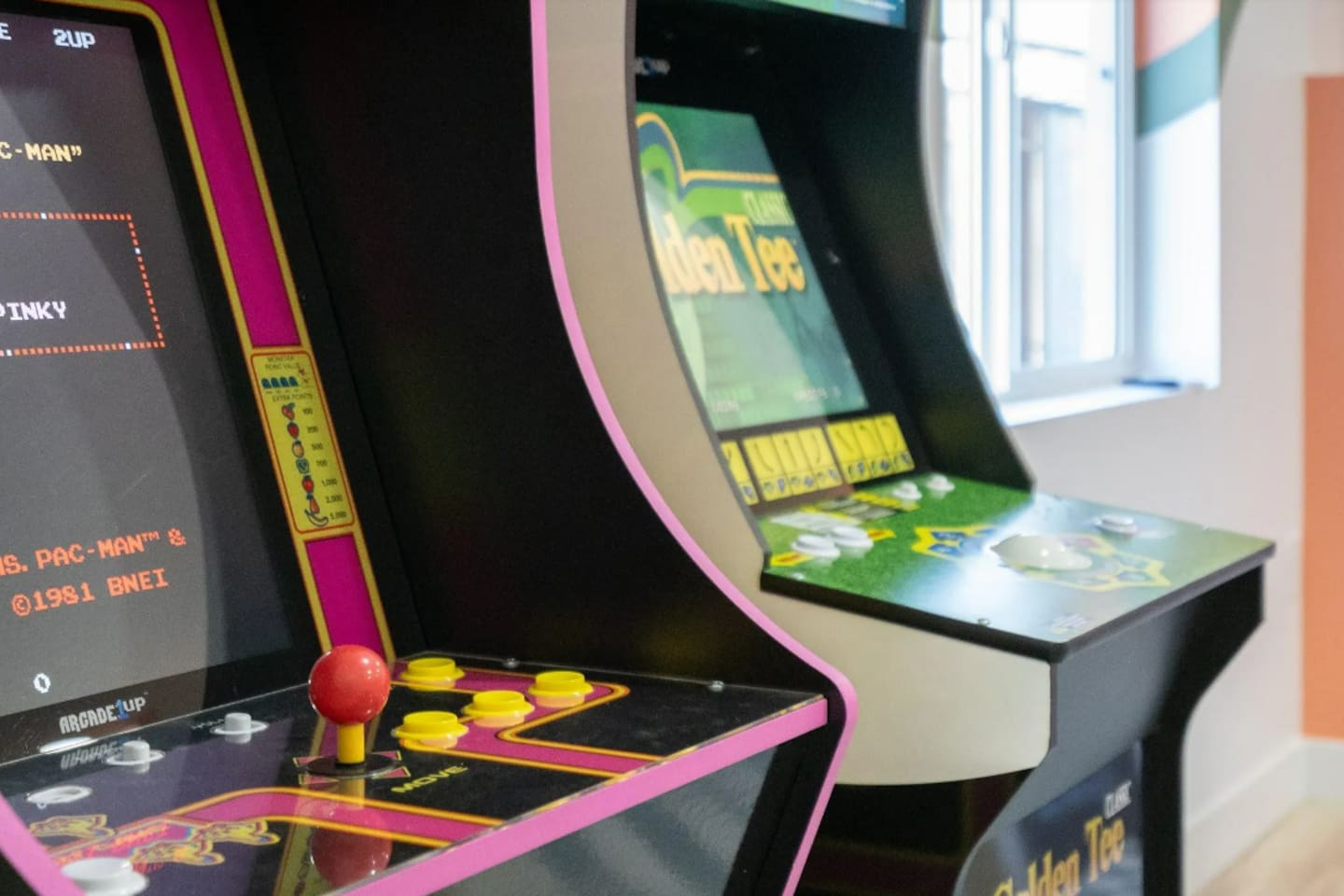 Classic arcade cabinets bring a nostalgic touch, perfect for a little friendly high-score competition.