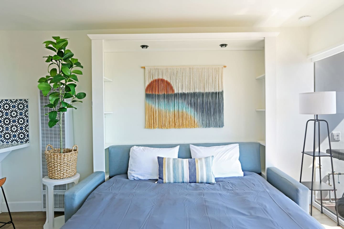 Here is a picture of the king-sized sofa murphy bed expanded. This bed is every bit as comfortable as a traditional bed with a premium mattress. This King murphy bed enables this one-bedroom condo to accommodate up to four people comfortably.