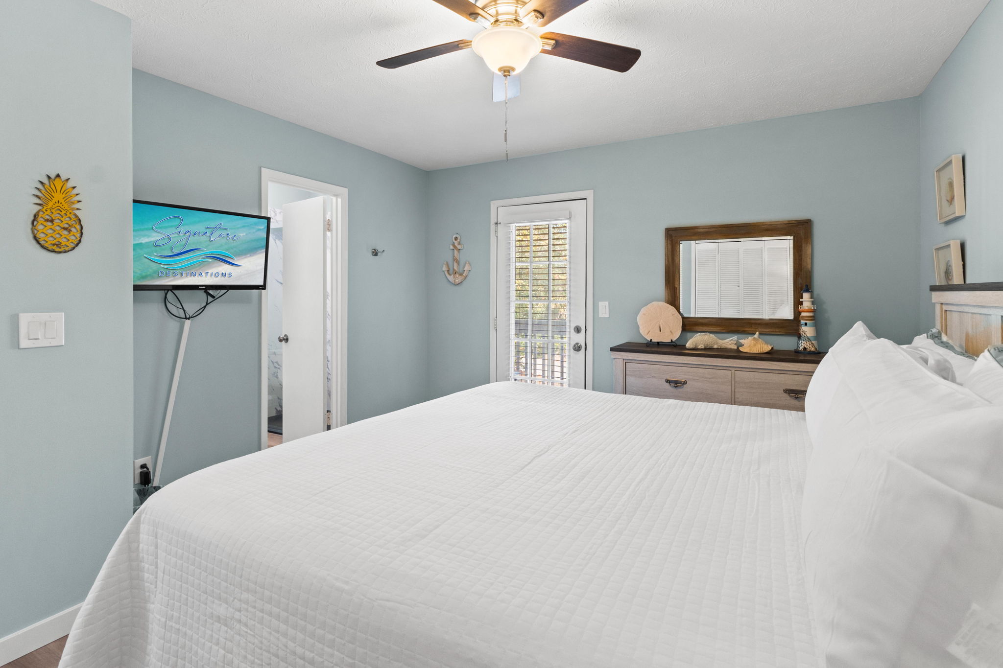 Master Bedroom with King Bed and Balcony Access