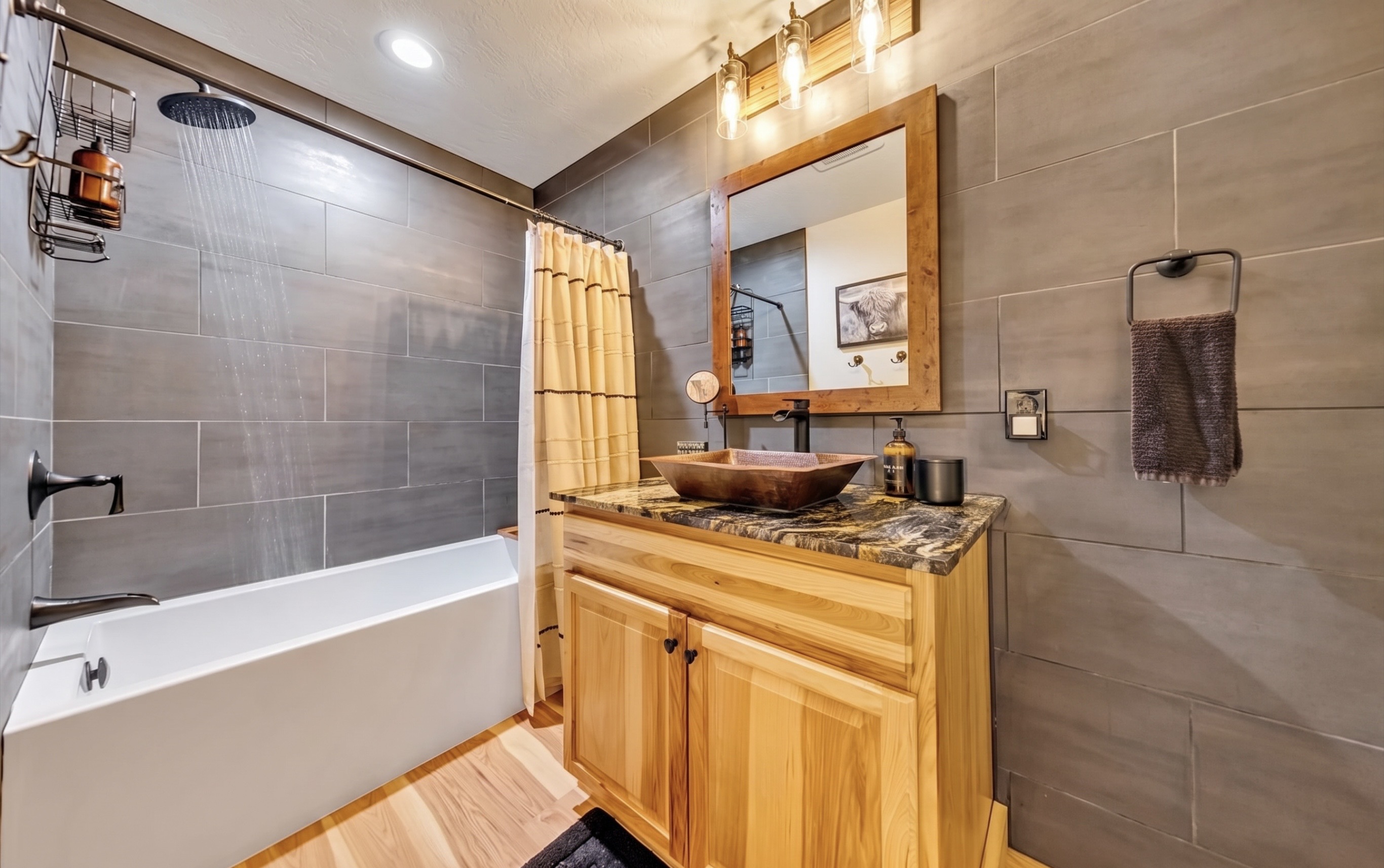 Downstairs Bathroom w/ a nice soaking tub for a nice relaxing bath.