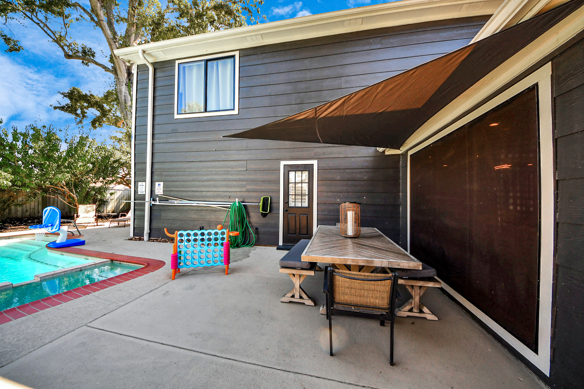 Tons of covered seating in this great backyard space!