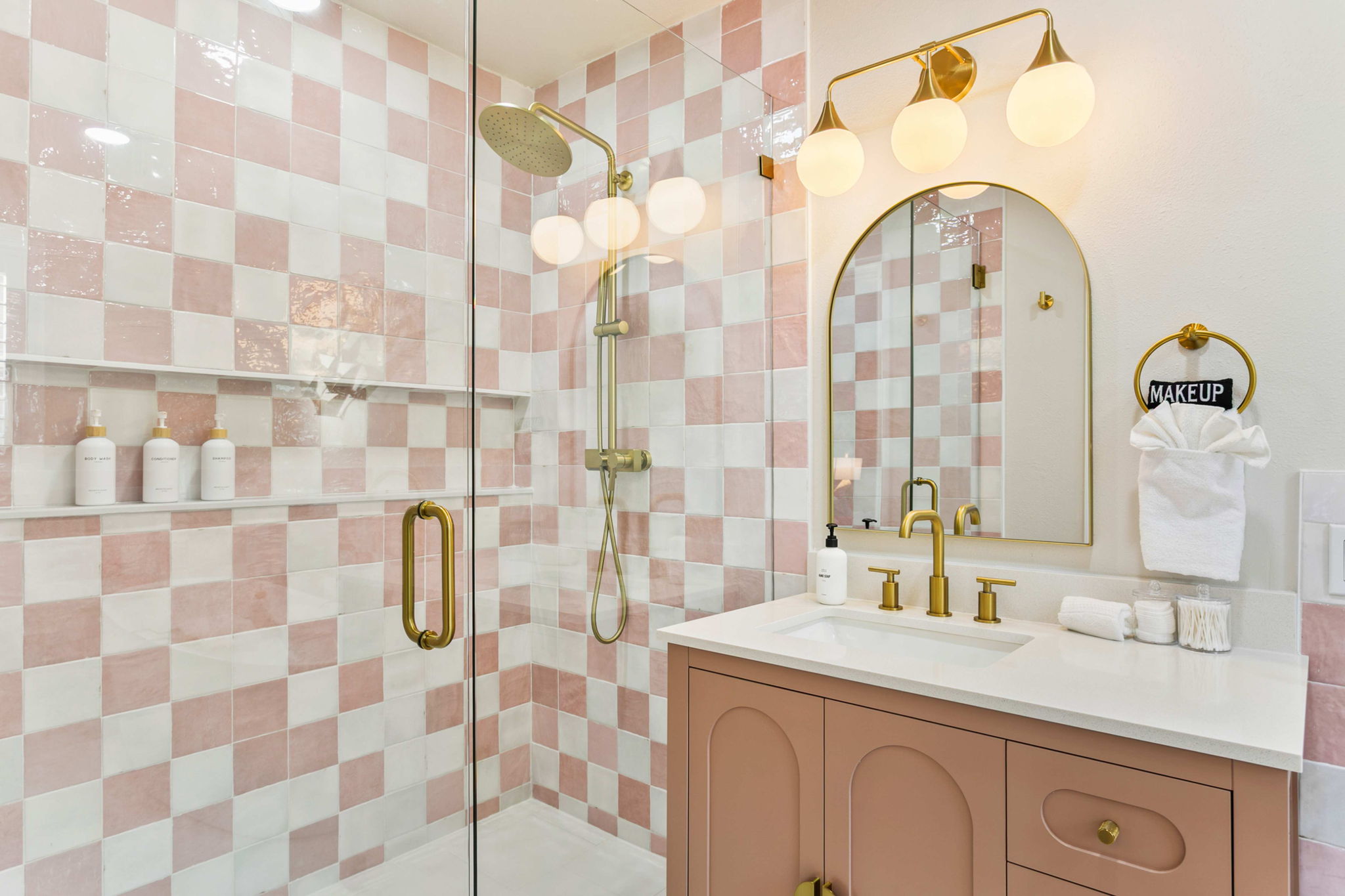Master bathroom with glass shower and a separate soaking tub