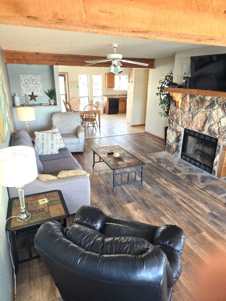 The Calm Cove open living room with fireplace – lakefront vacation rental in Osage Beach, Missouri