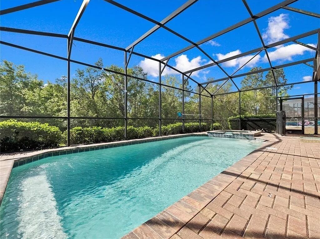 Large bench seat in the pool to play, and hang out while in the water!