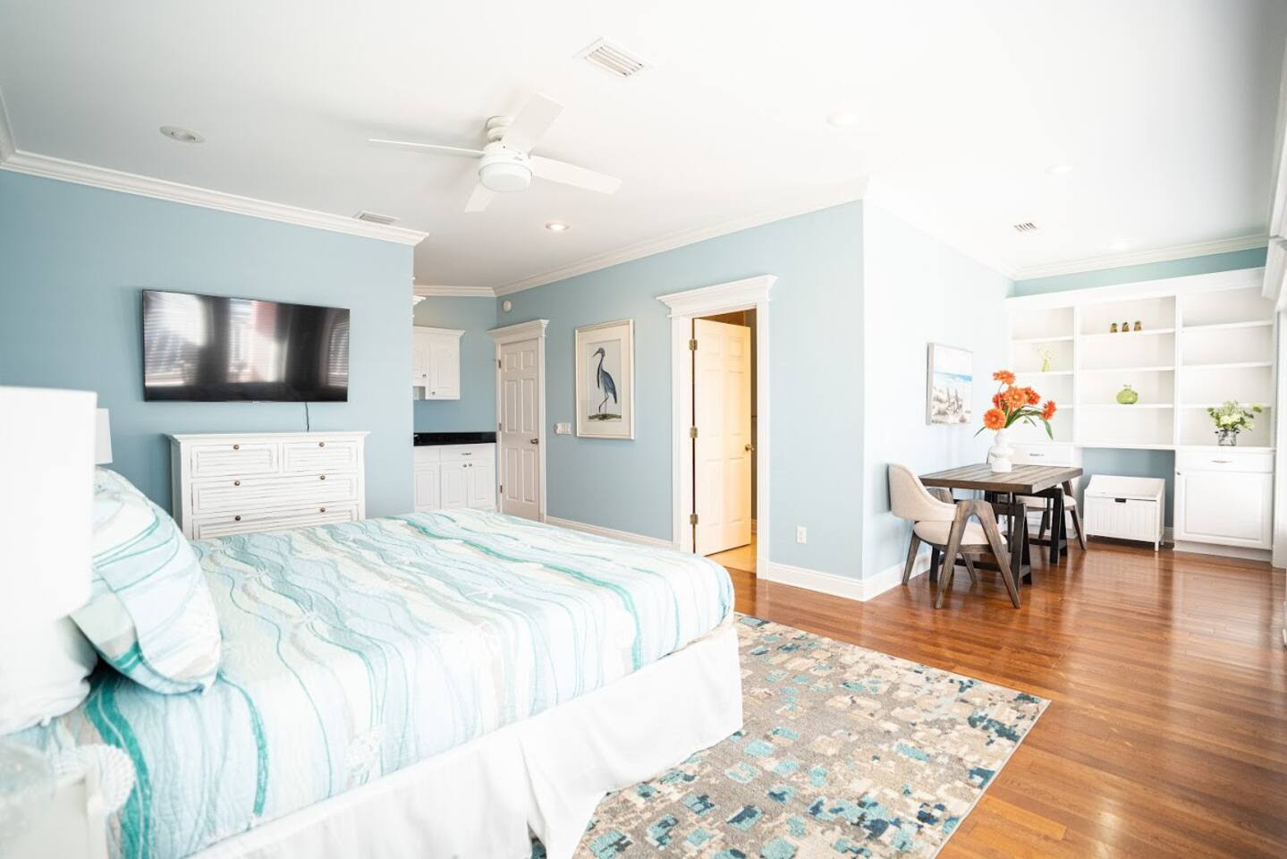 Master bedroom with king size bed, private bathroom, reading/desk area, private front porch facing the Gulf of Mexico and private kitchenette.