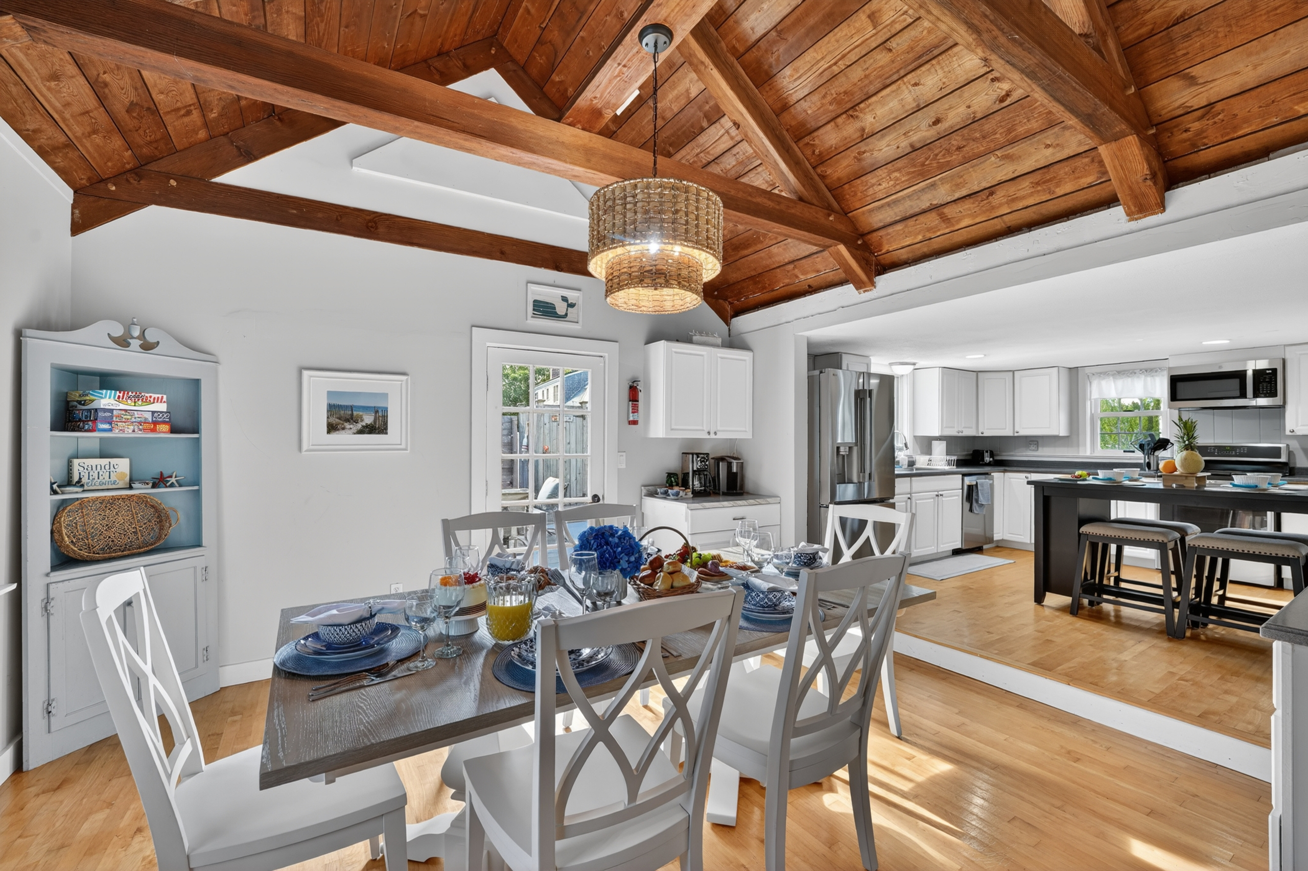 Open dining area with easy access to the kitchen, providing a comfortable space to dine, relax, and connect.