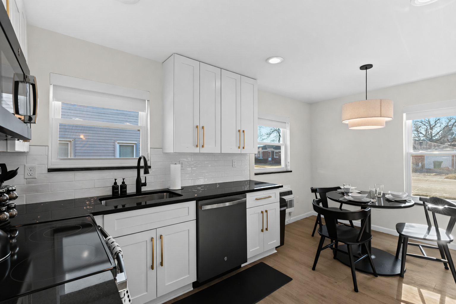 Bright, open kitchen and dining area with modern appliances, sleek finishes, and plenty of natural light—perfect for cooking, dining, and entertaining.