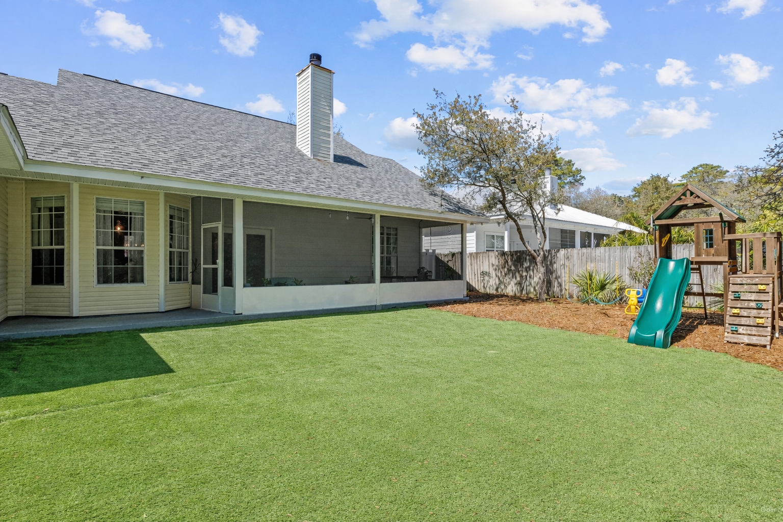 Fully fenced and full of fun- kids love the play set, and you'll love the worry free turf yard. Great space for the furry friends to play.