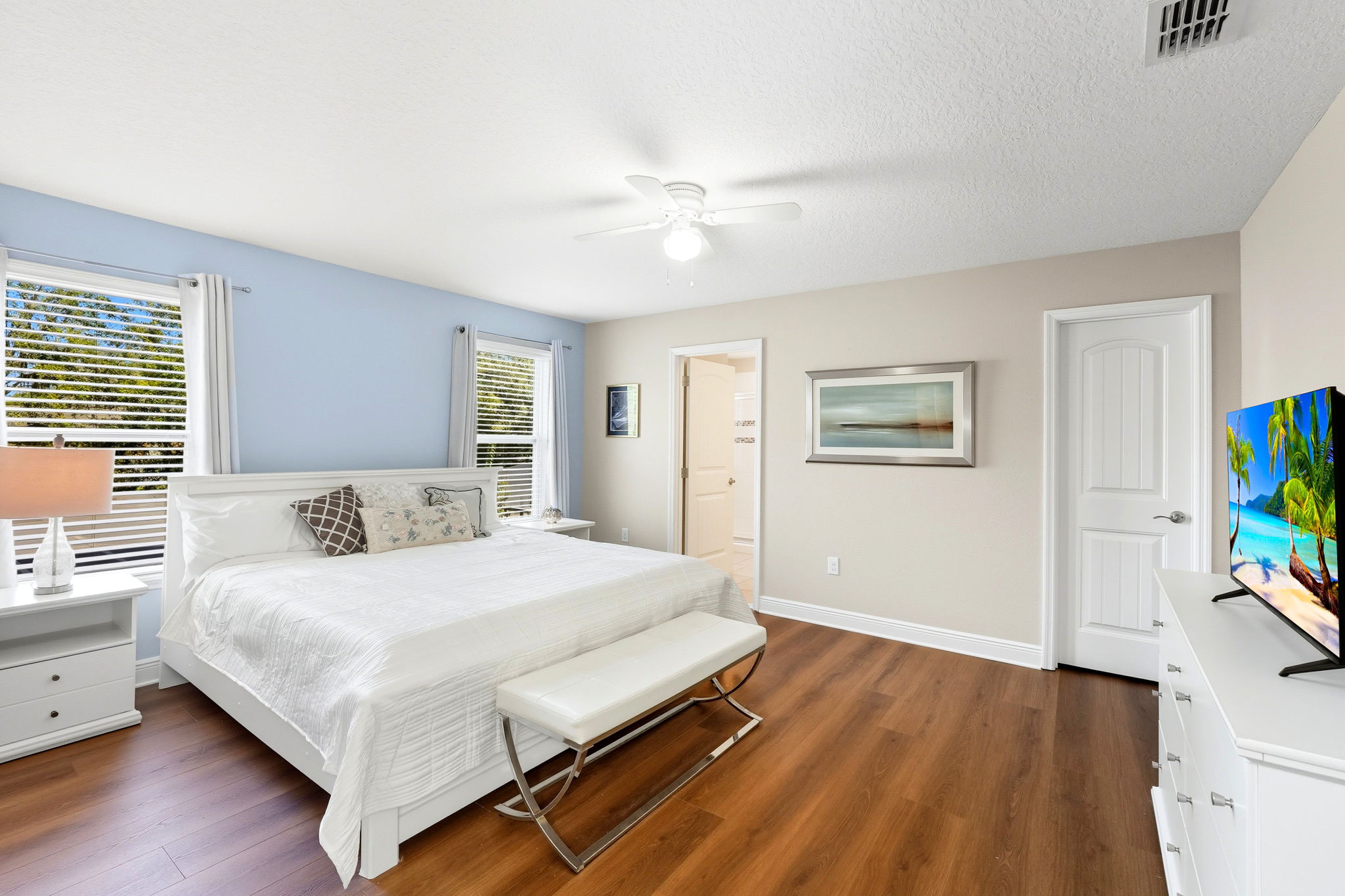 Grand-Inspired Suite (King Ensuite Bathroom) Elegant resort stye suite with soft tones and timeless charm.