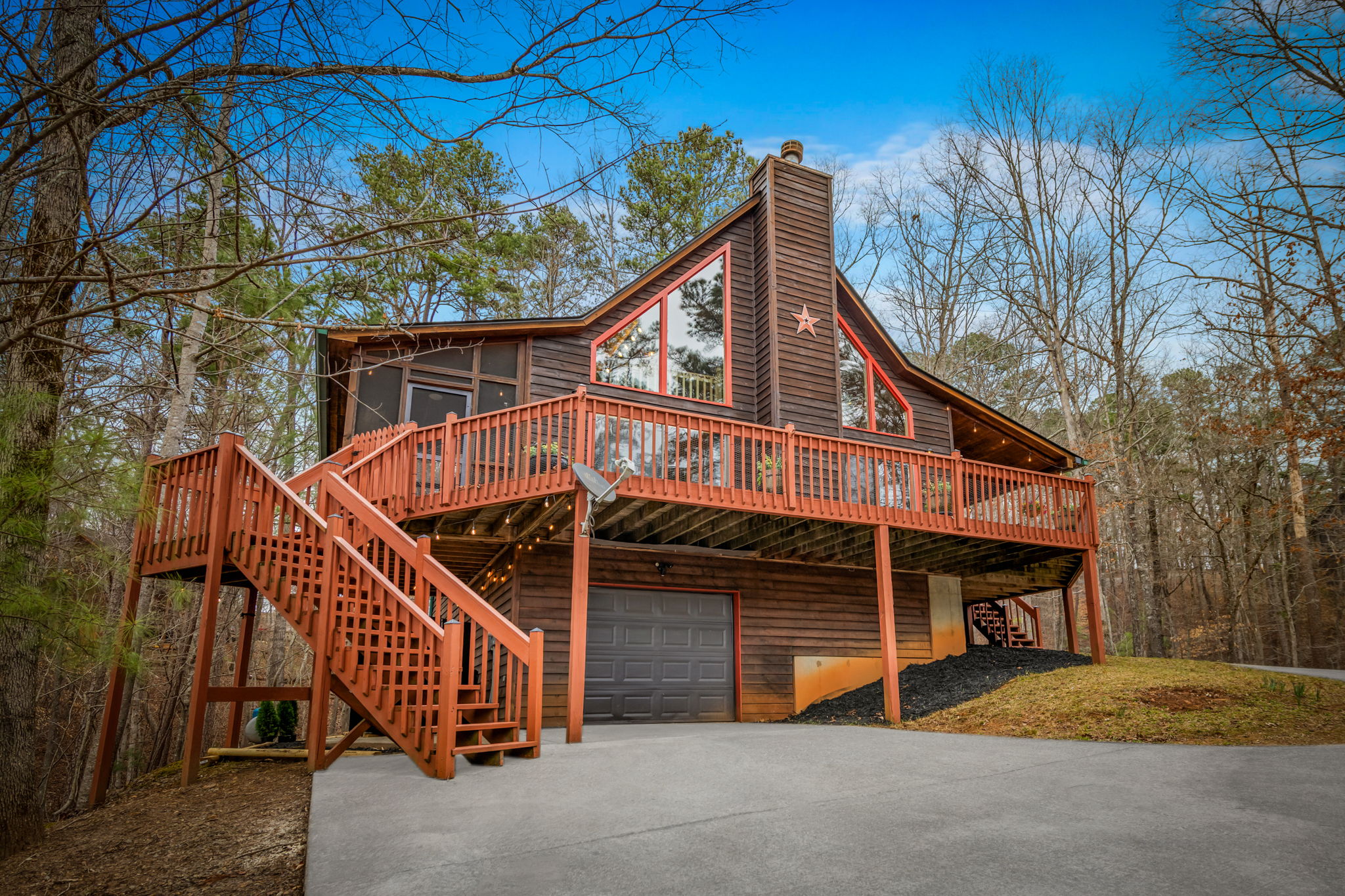 Surrounded by mature trees, the property offers a sense of privacy and natural beauty.