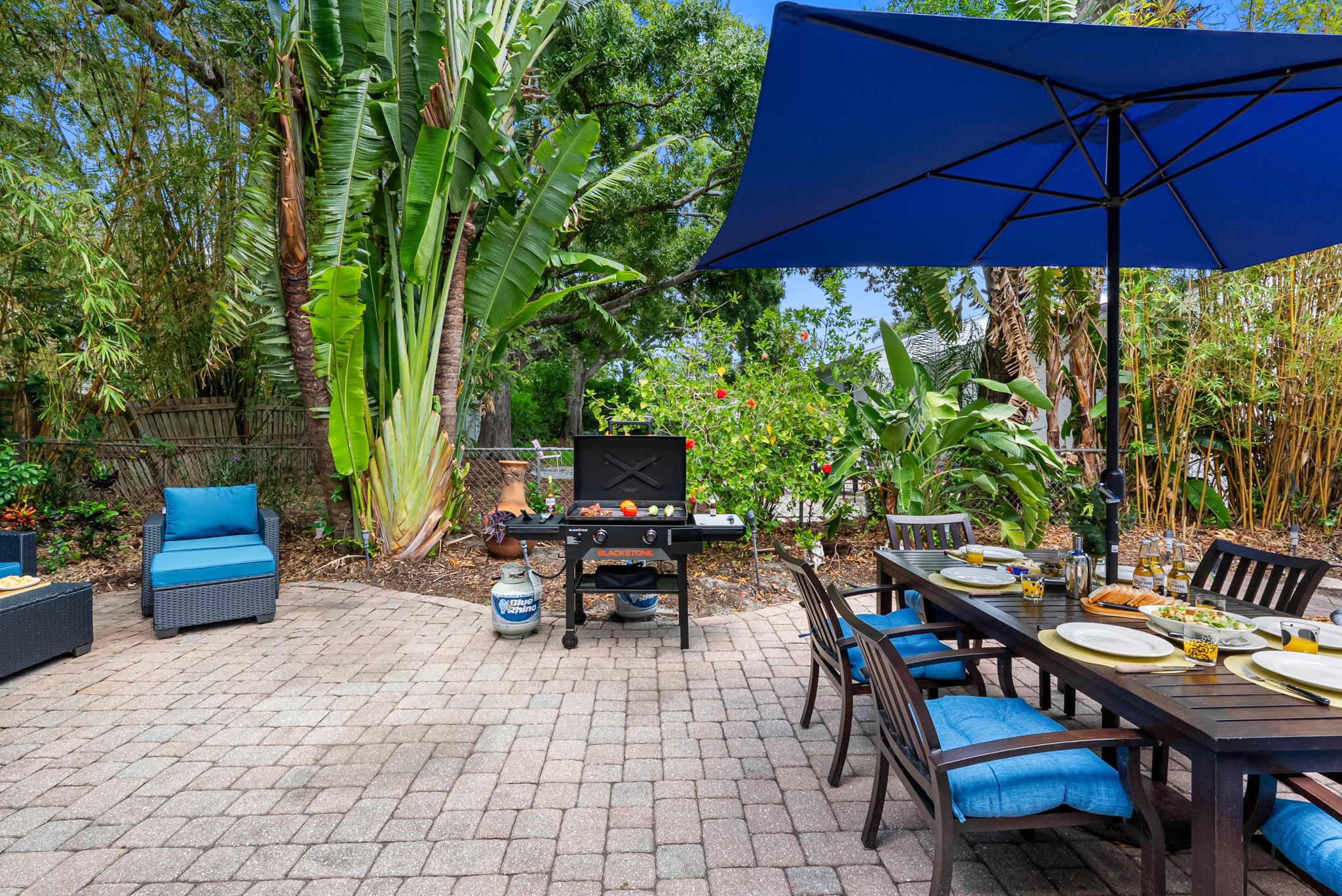 This backyard oasis is perfect for morning coffee, sunset dinners, or late-night conversations under the stars.