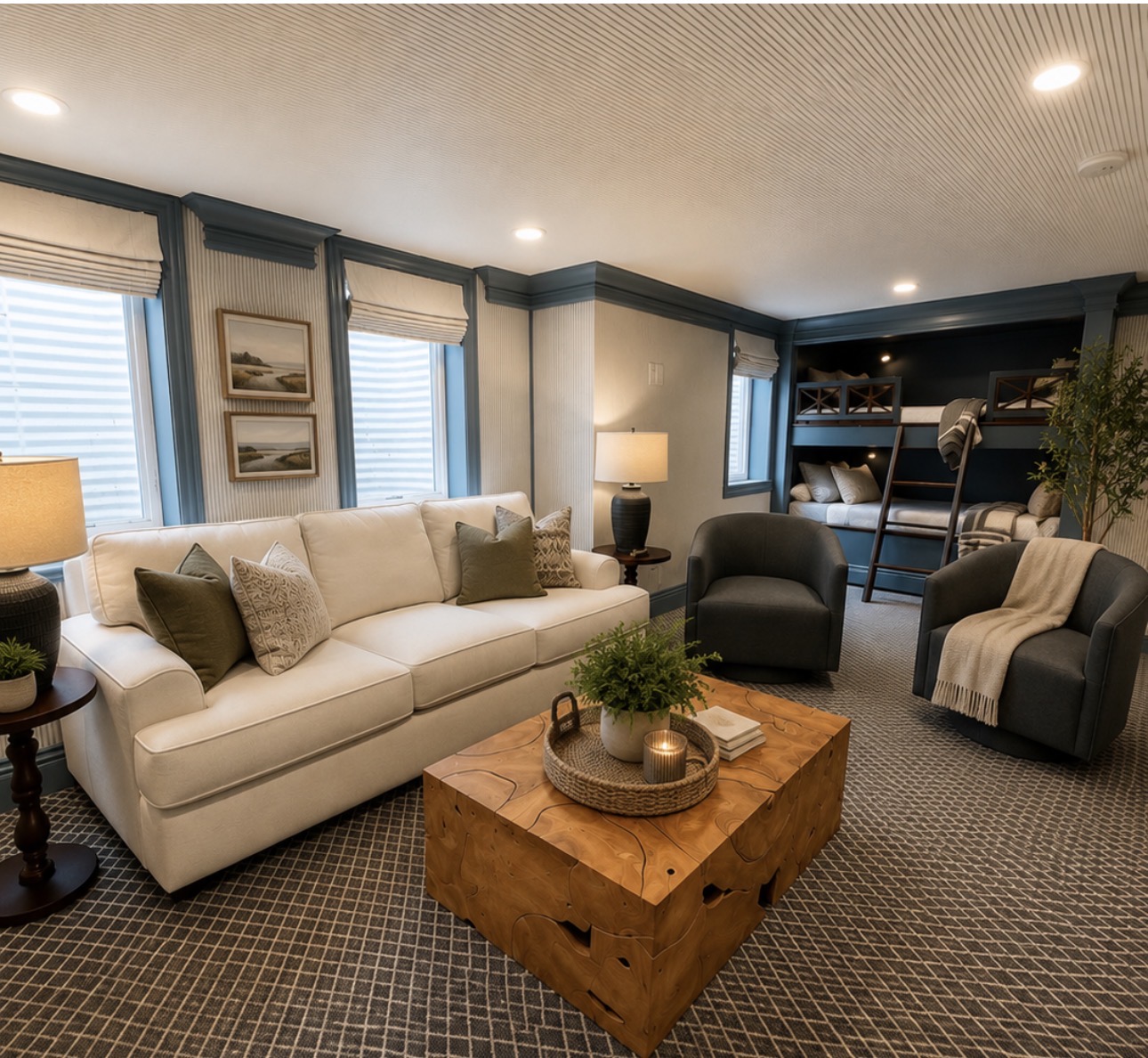 Part of the basement bunk room, this comfortable lounge area offers extra space to relax, watch TV, or gather with friends and family. The queen sleeper sofa provides additional sleeping accommodations, making it ideal for larger groups and extended stays.
