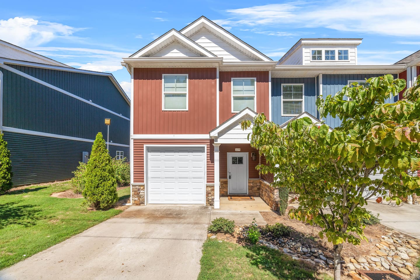 Welcome to your Spartanburg stay, featuring a modern facade with a private driveway and garage.