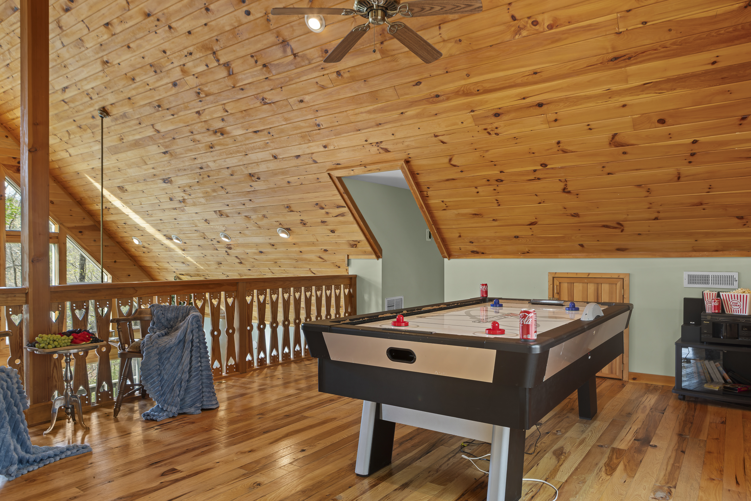 Game Area: Unleash your competitive spirit with air hockey and movie nights in this vibrant space!