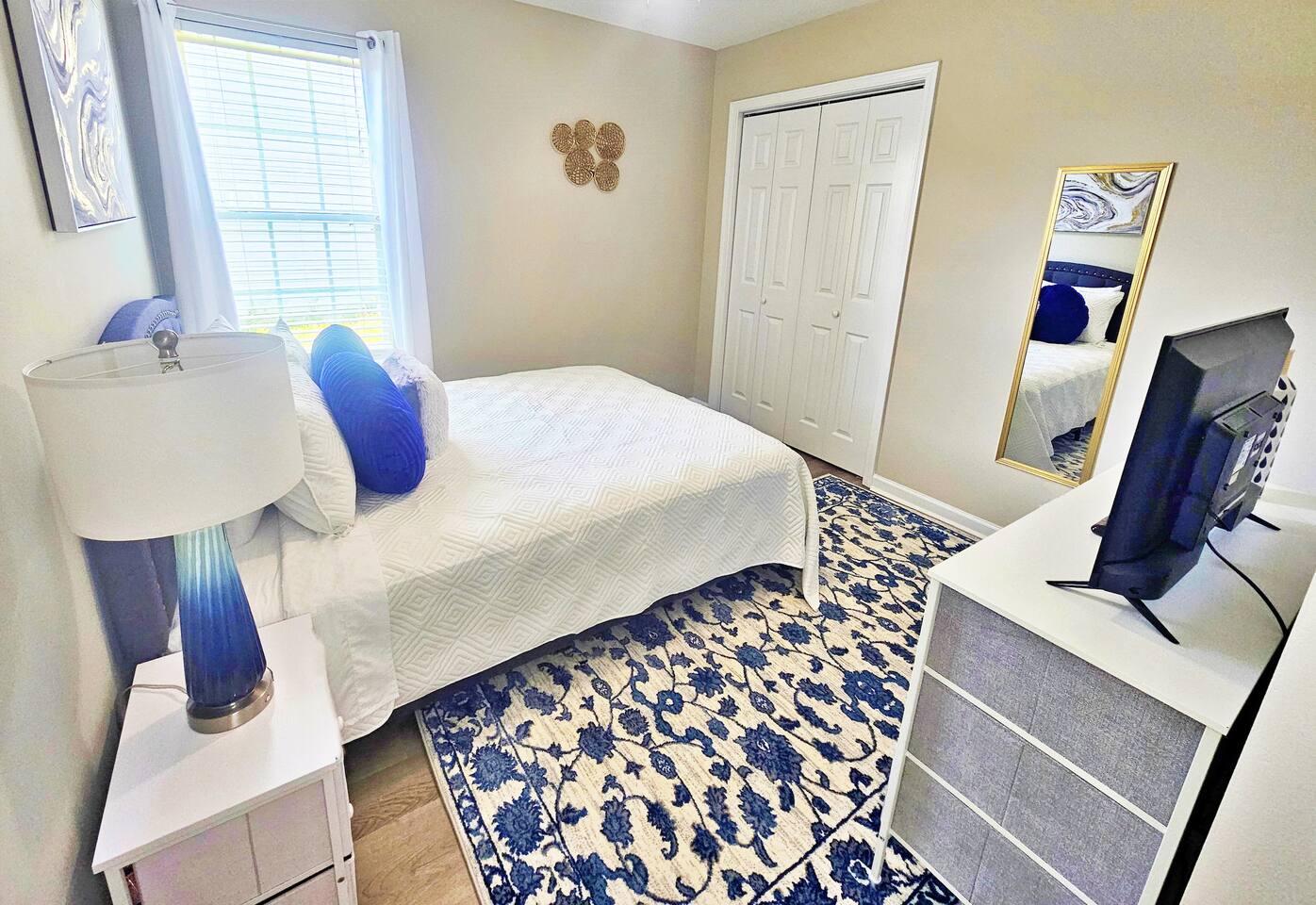 Full-length mirror & closet space.